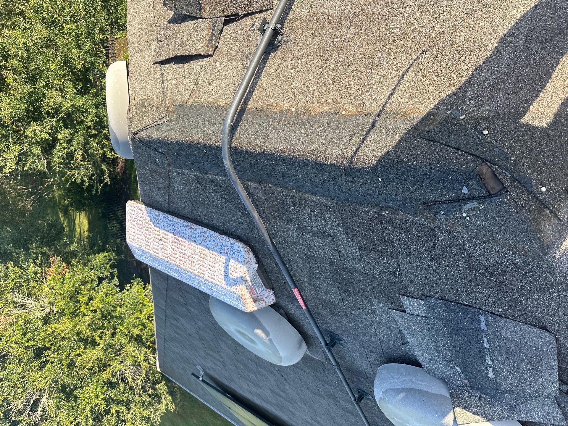 Hail Damage using Owen's Corning Duration (Lifetime) Shingles by Roof Repair Company