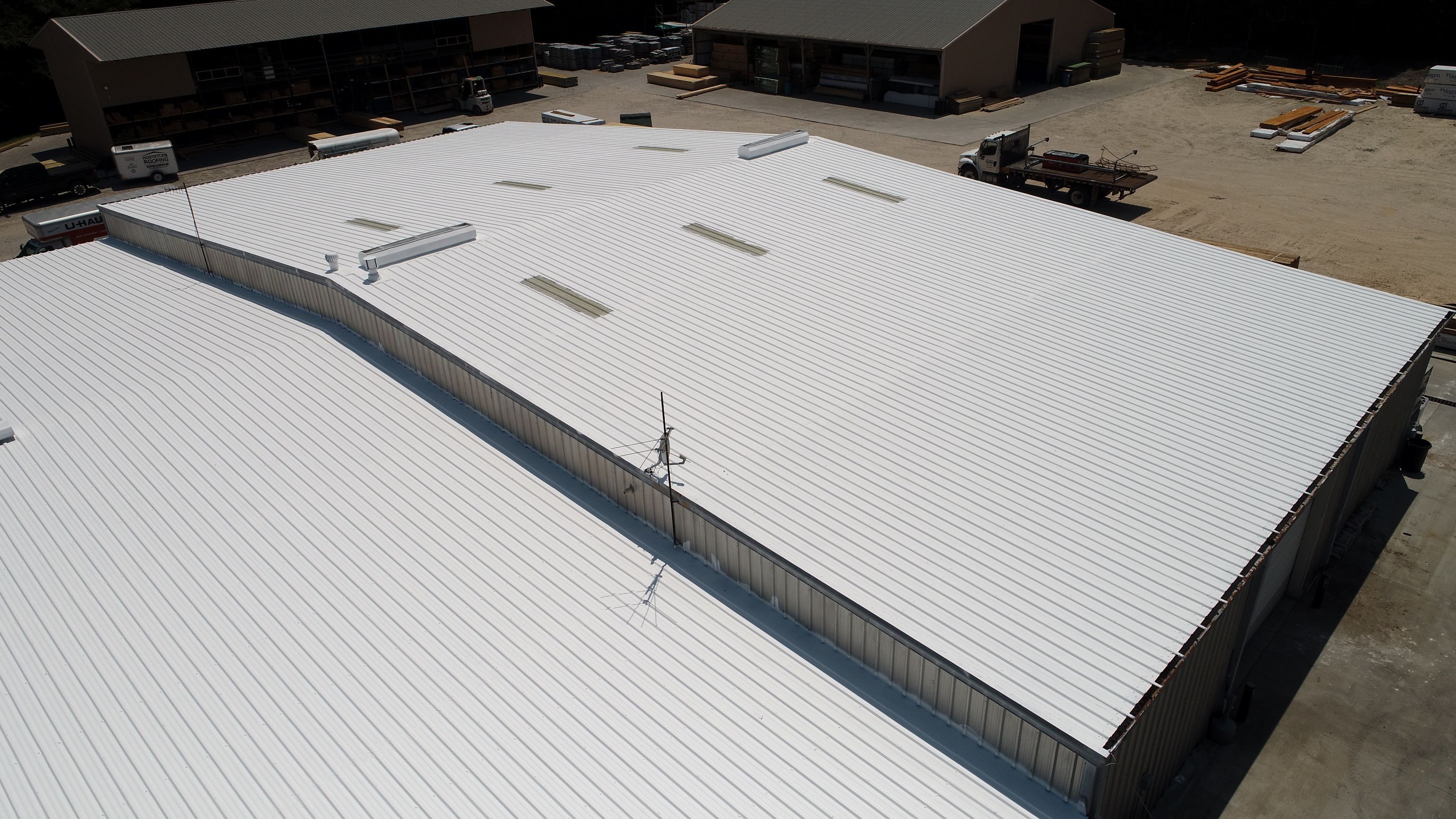 Commercial Roofing Installation using Aldocoat Coatings by Hostetler Roofing