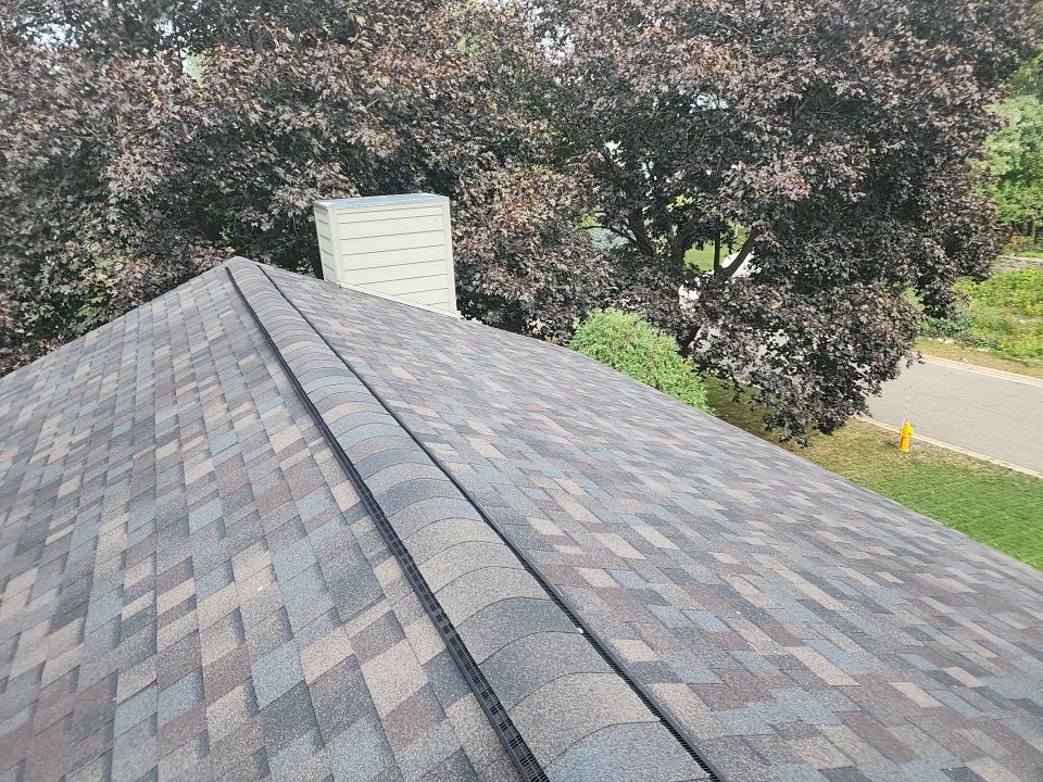 Storm Restoration – Roof, Gutters & Gutter Guards | Golden Valley, MN by First Impressions Exteriors