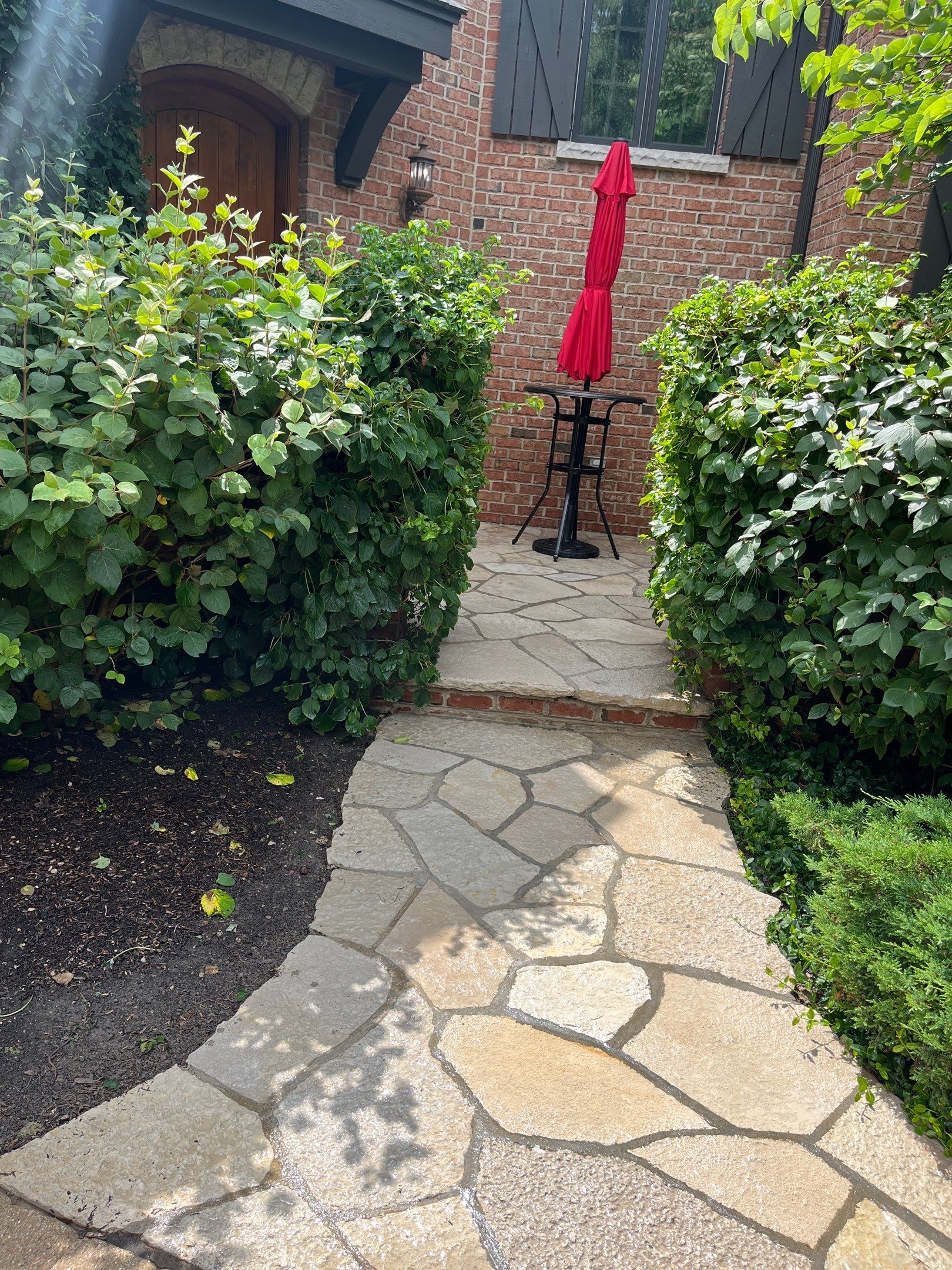 natural stone using Algaecide, soft wash soap by Northern Power Washing LLC.