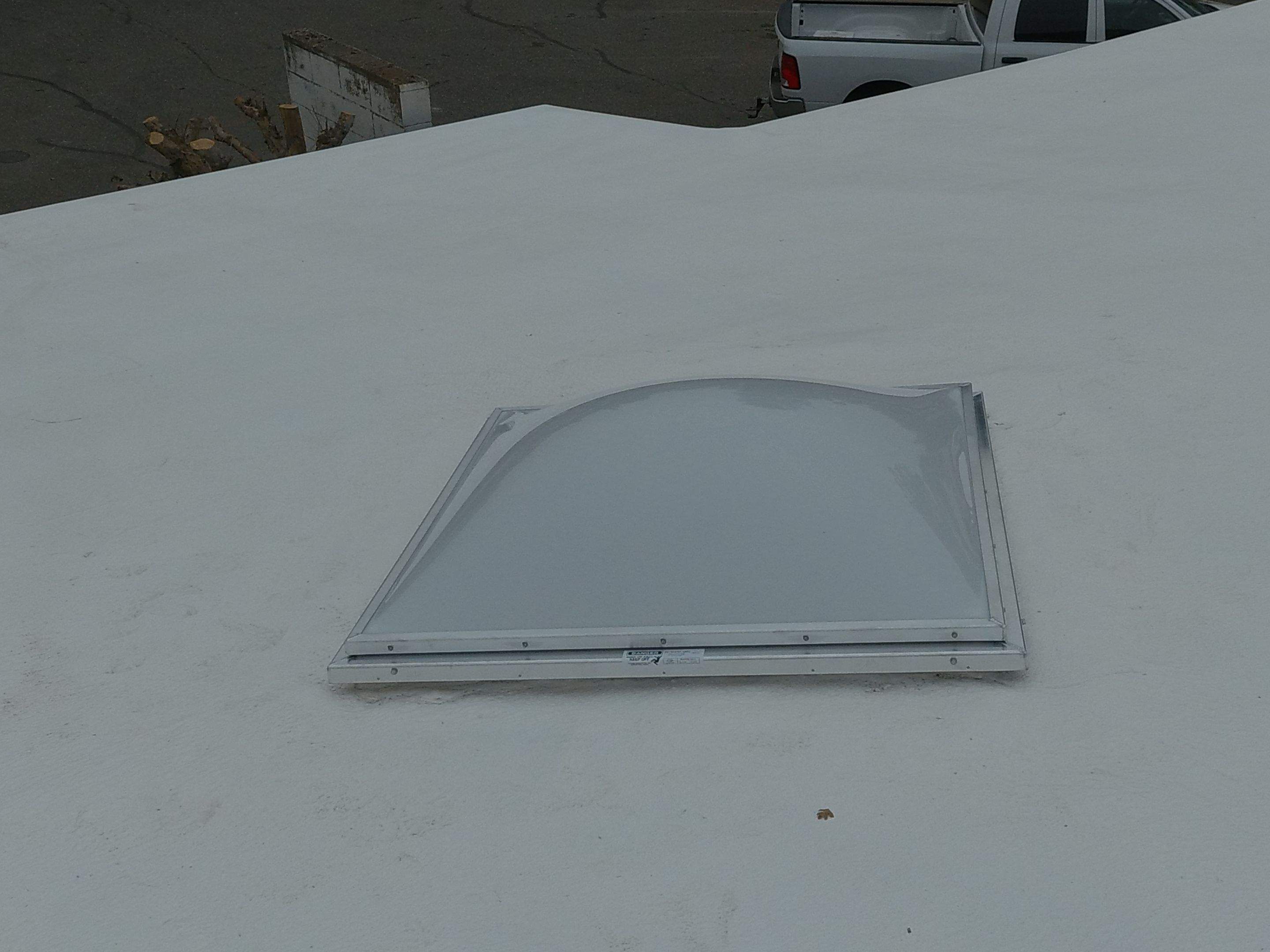 Spray foam and coatings using Conklin Benchmark/PUMA XL coatings and spray foam by Straight Edge Roofing Inc