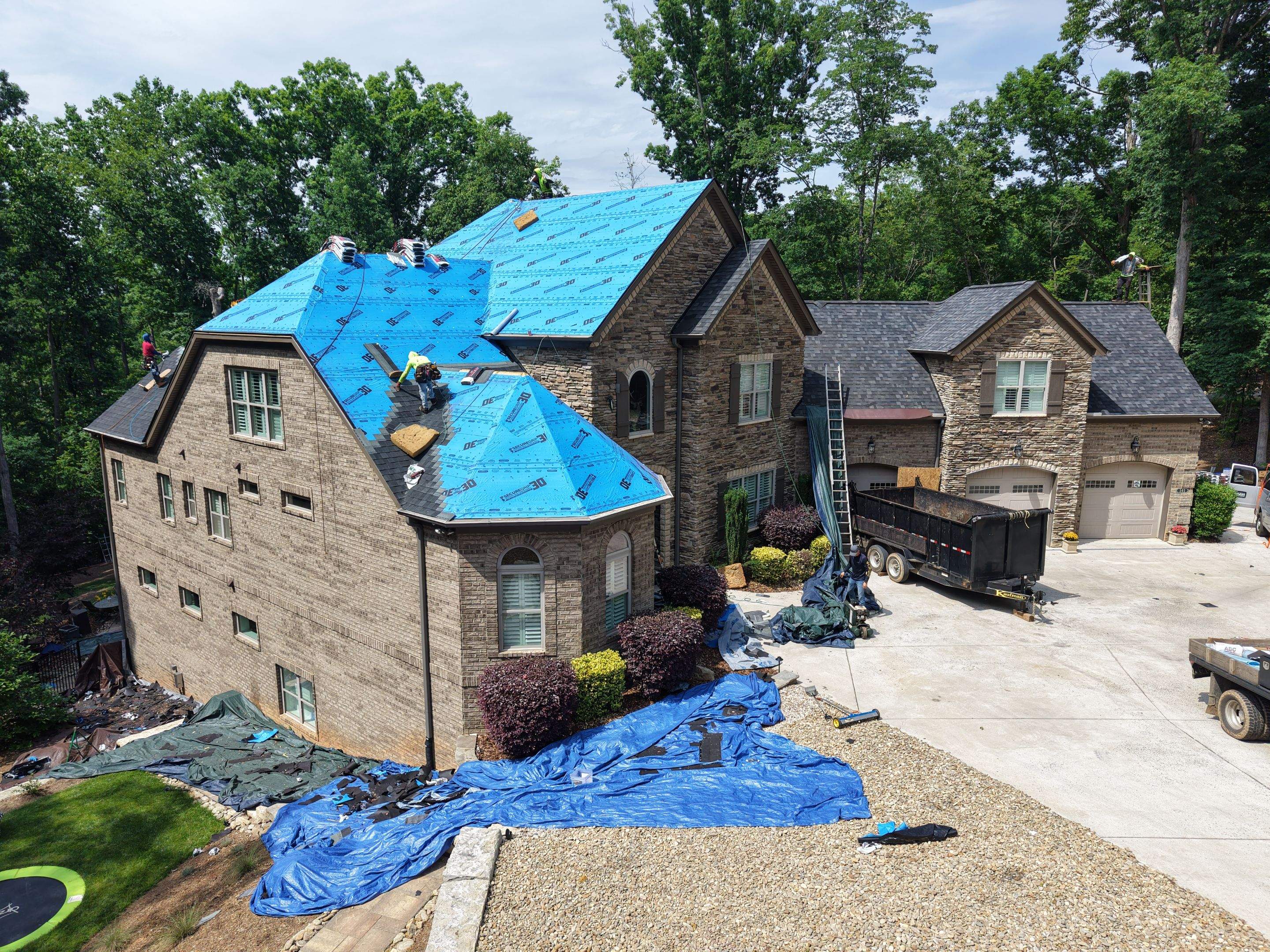 Residential Roofing Installation using TAMKO Titan XT Rustic Black by RISE Roofing & Restoration, LLC