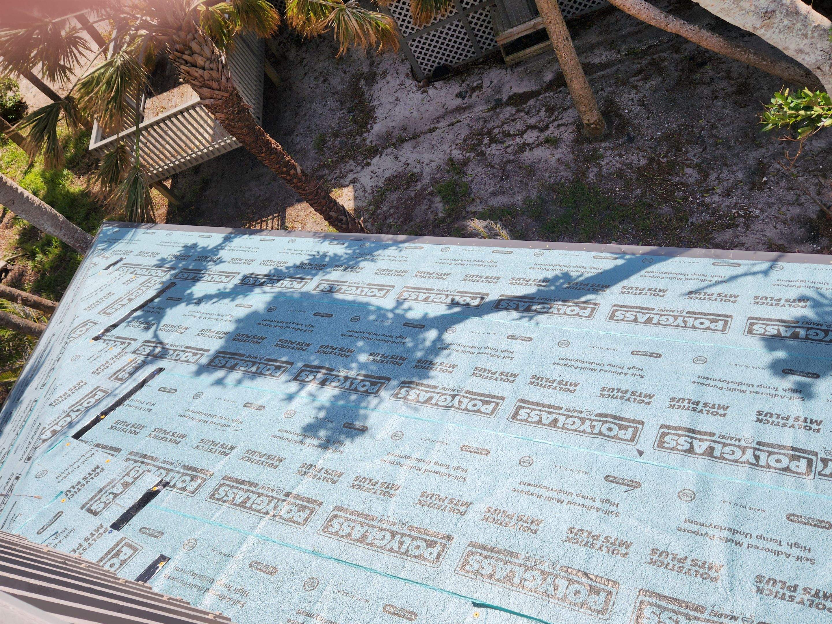 Residential Roofing Installation using Gulf Coast Metals Gulf Seam Panels by Four Peaks Roofing