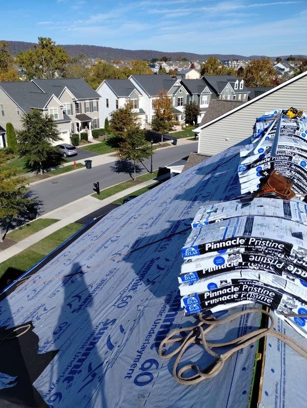 Residential Roofing Installation using Atlas Pinnacle Pristine Black Architectural Shingles by Frederick Roof Repair