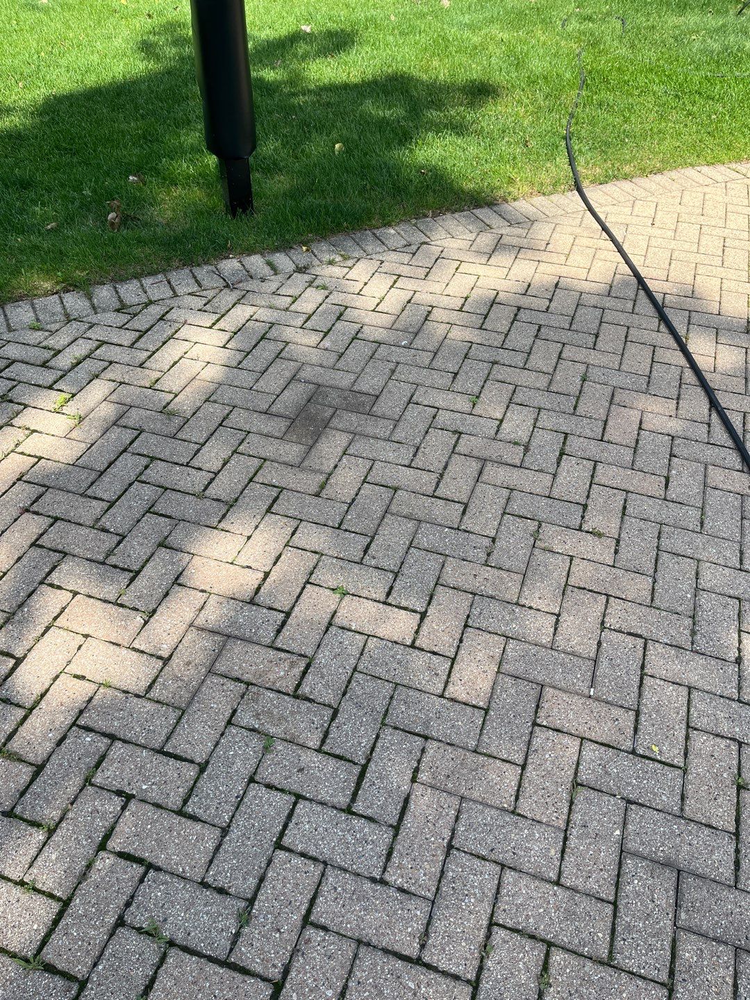 Brick paver repair, cleaning and sealing by Northern Power Washing LLC.