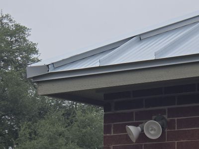 Close up of standing seam metal roof edge detail.