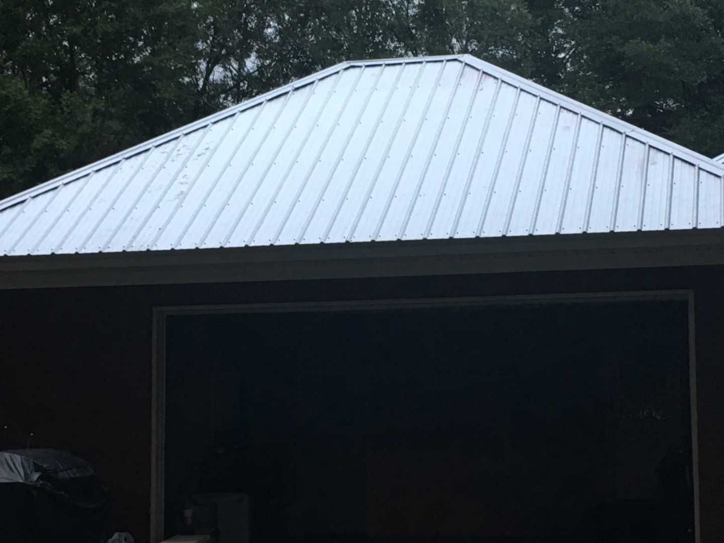 Residential Roofing Installation using Metal roofing by American Roofing & Construction LLC