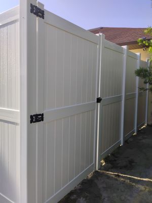 8'H White Vinyl Privacy Fence Installation in North Port