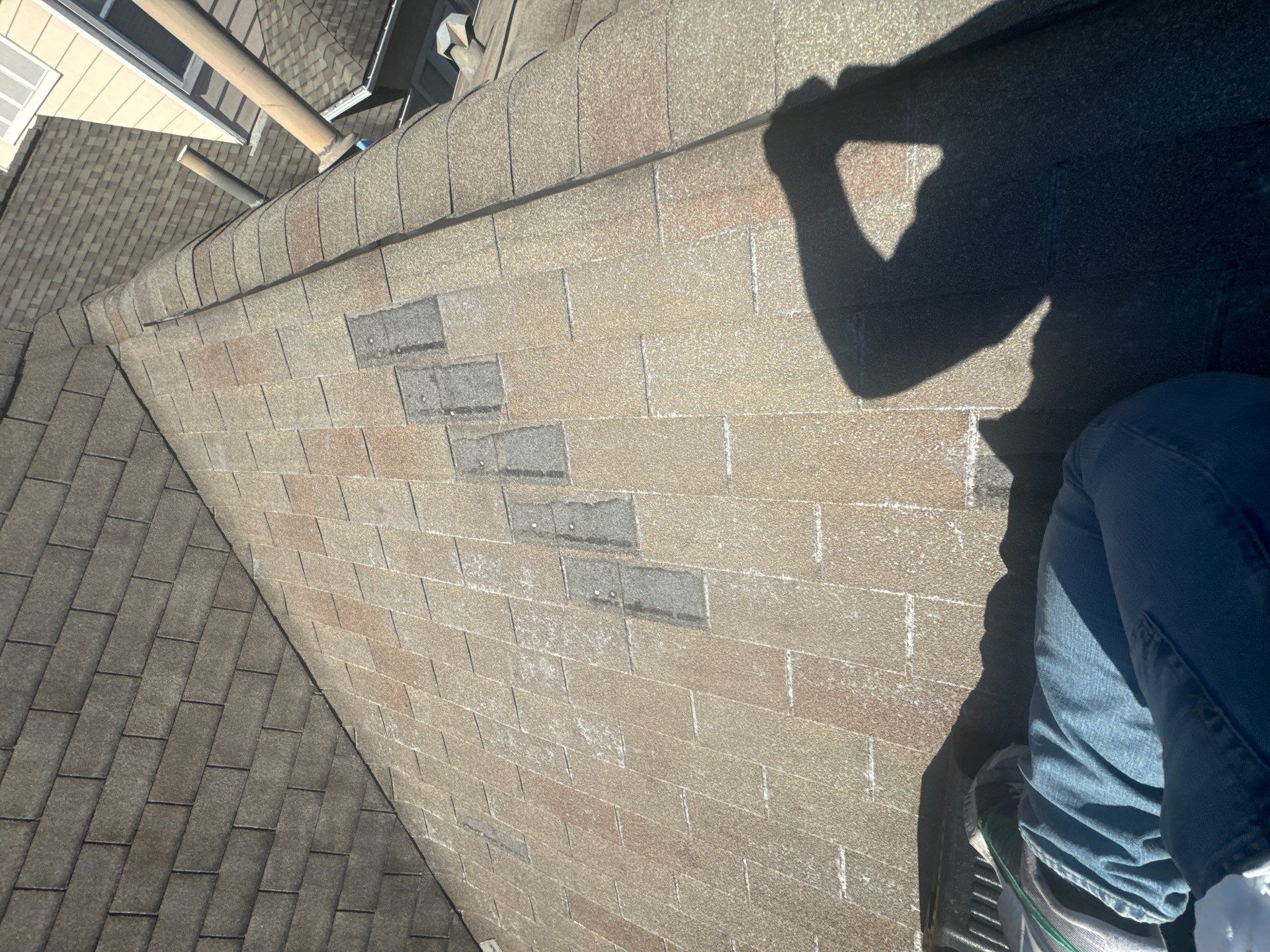 Missing Shingles Wind Damage  by Associates Roofing Unlimited 