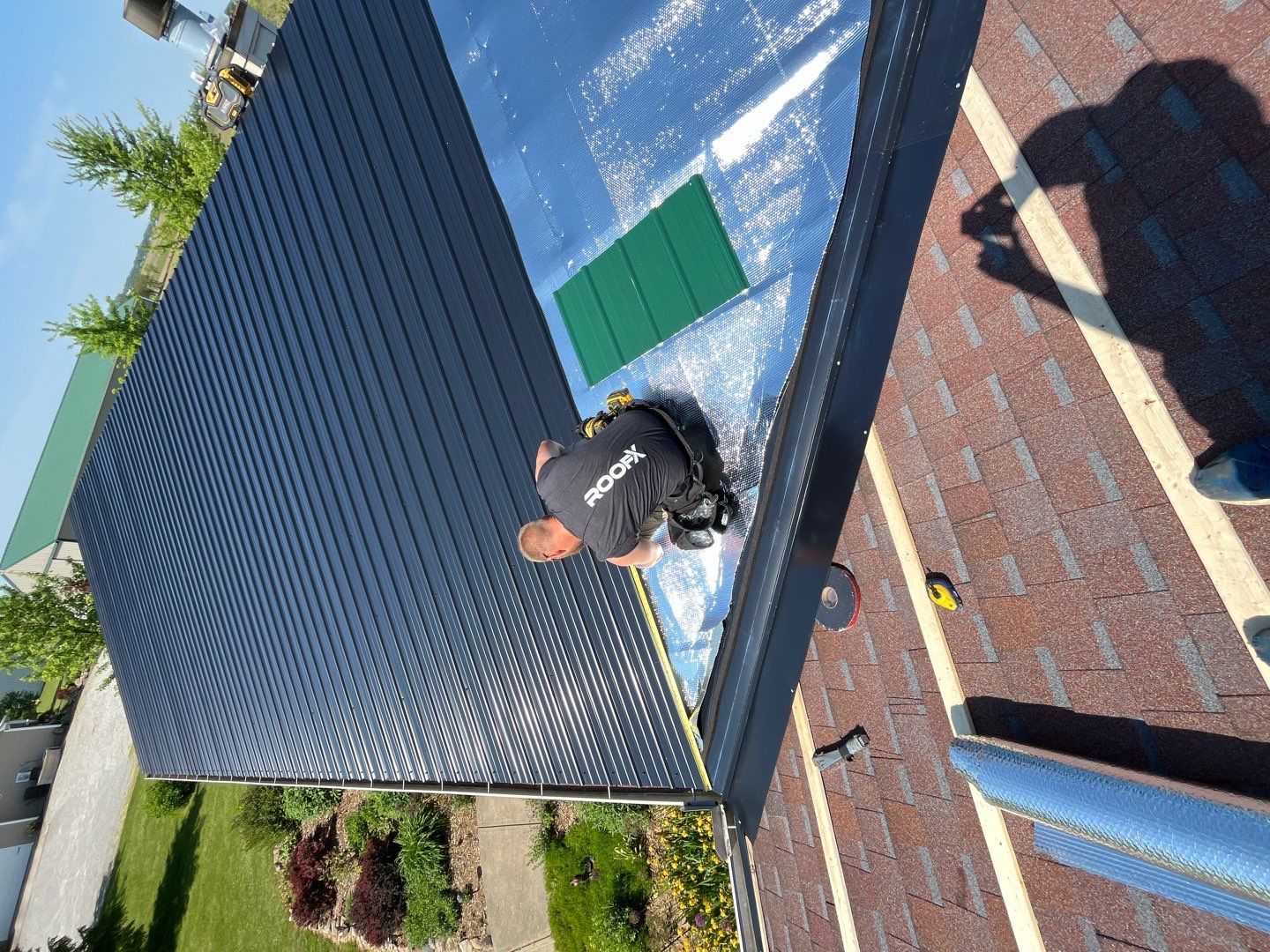 Residential Roofing Installation using Perfromance Panel Metal - Black by RoofX 