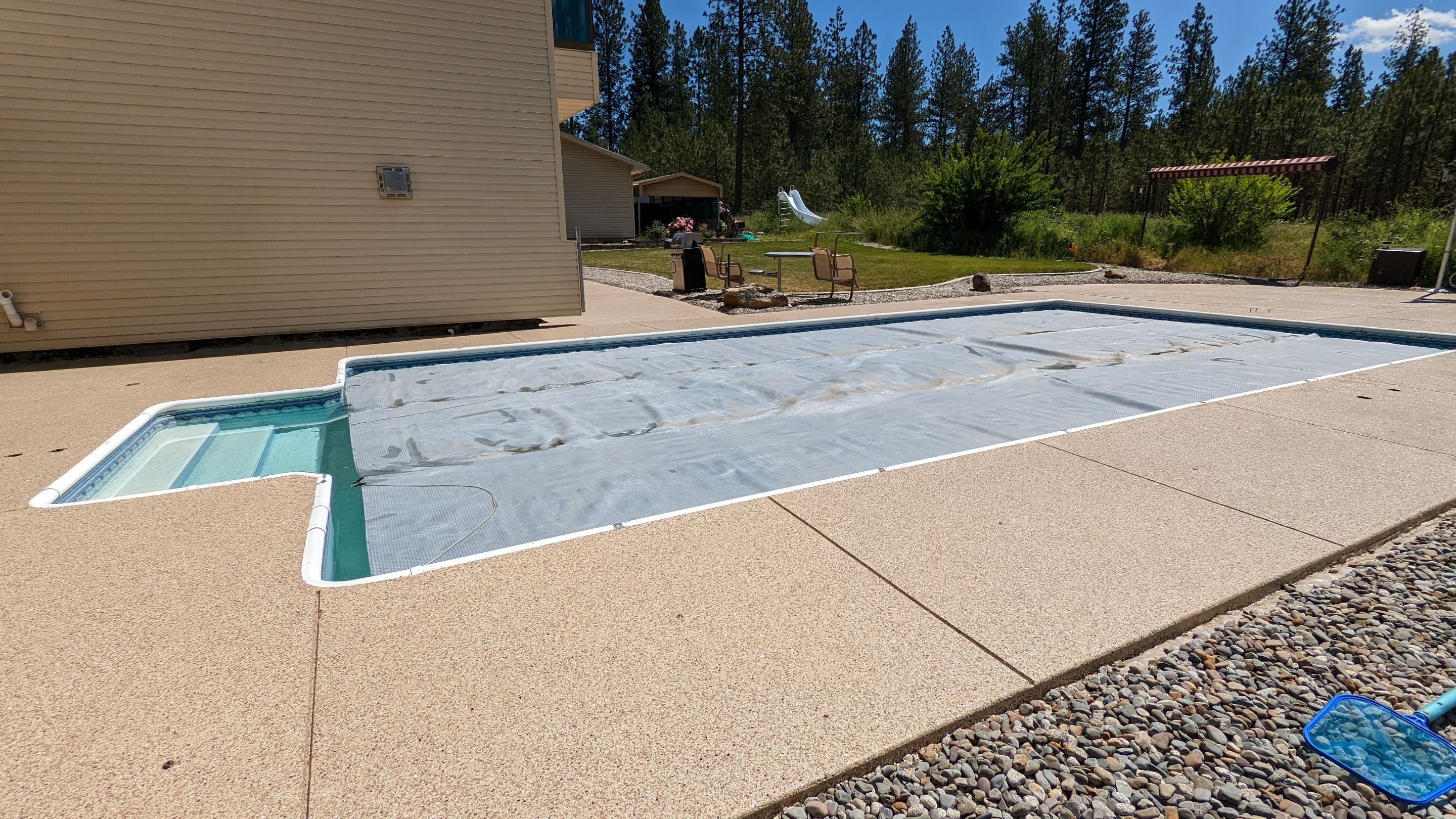 Garage Transformation using Domino for Garage and Pecan for Pool Deck by Croc Coatings, LLC