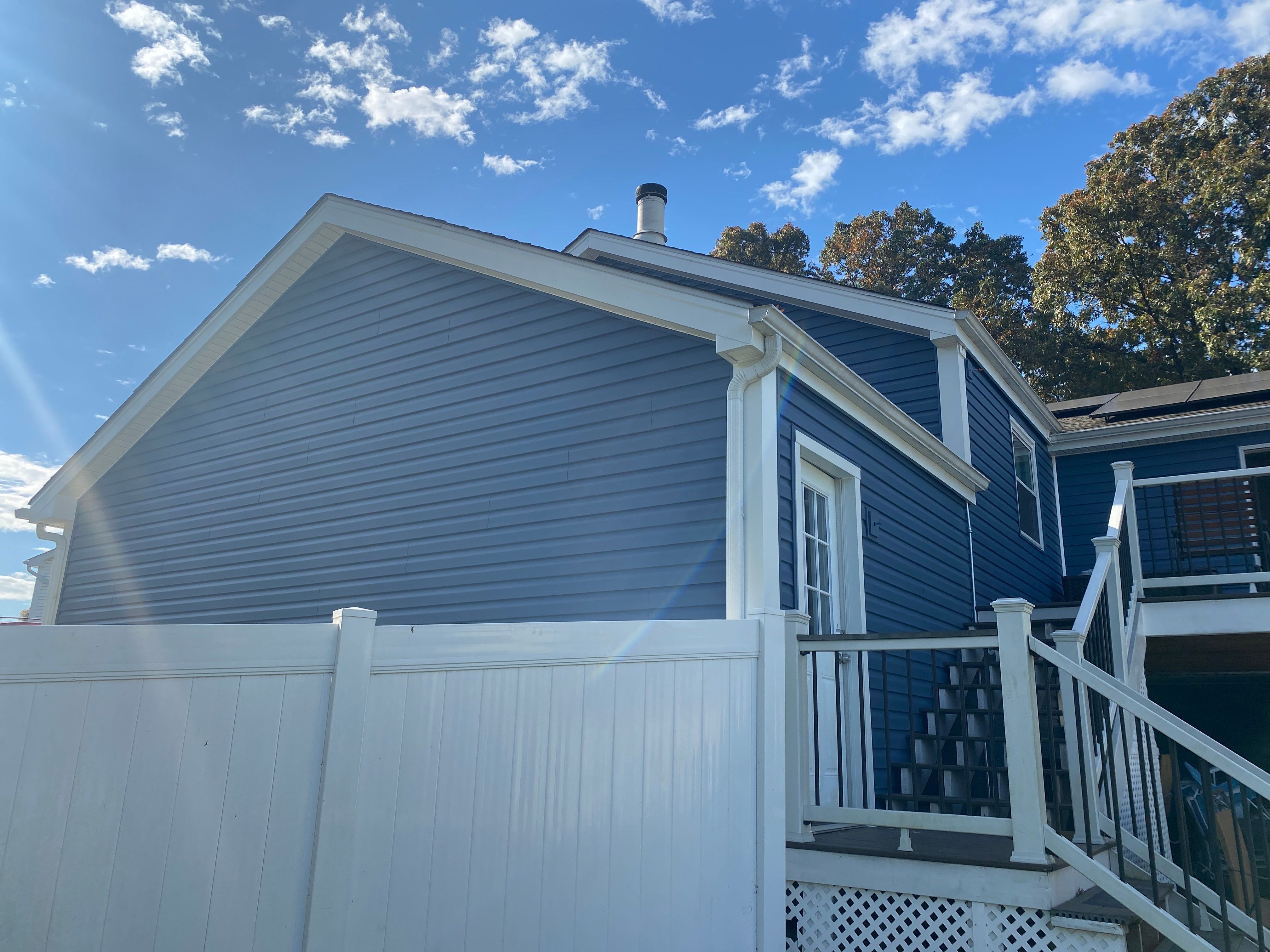 MASTIC Siding + Gutter Update by American Home Contractors