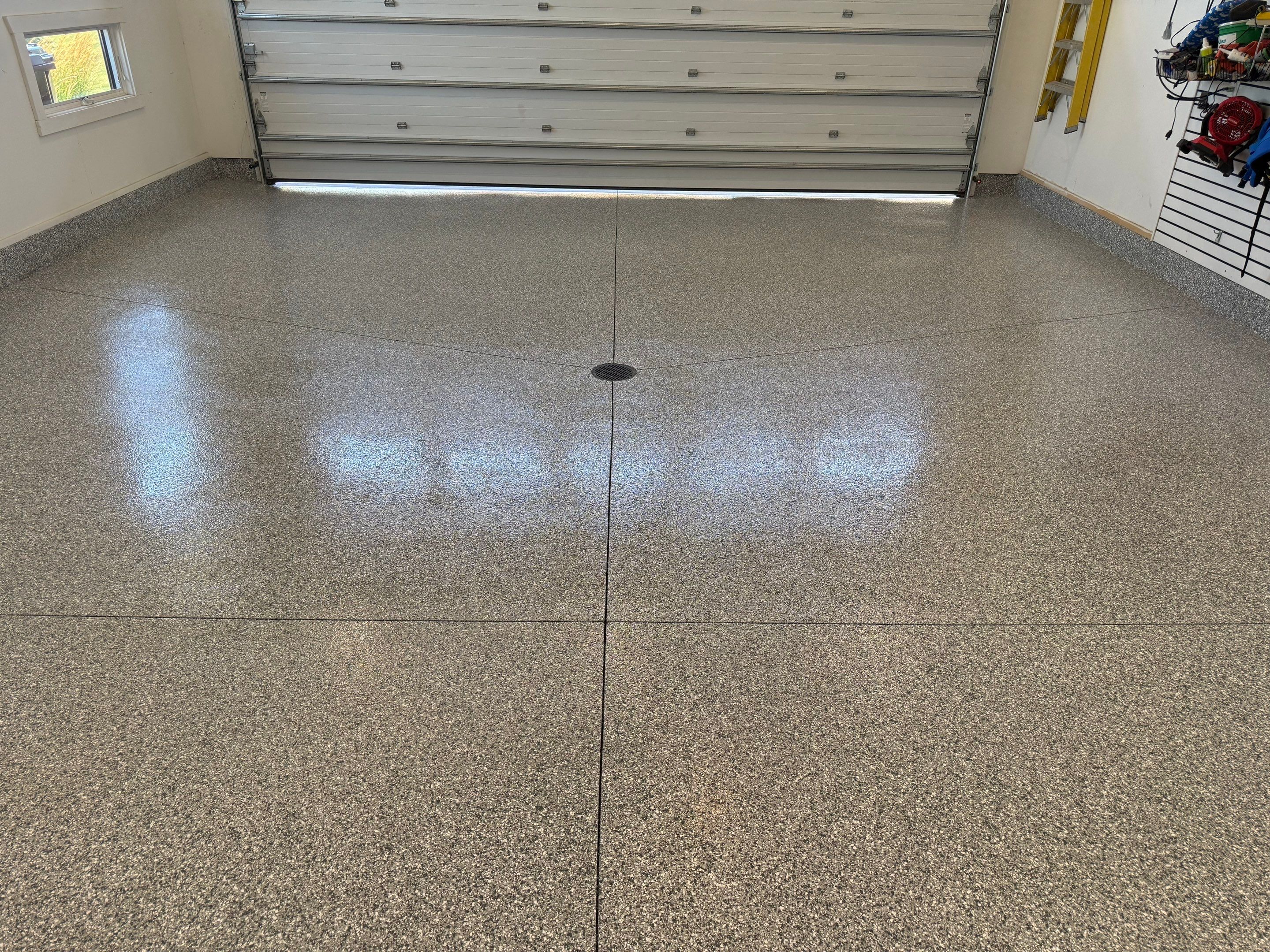 Gravel Flake Garage Floor Coating in Yankton by Select Painting, Coatings & Garage Cabinets