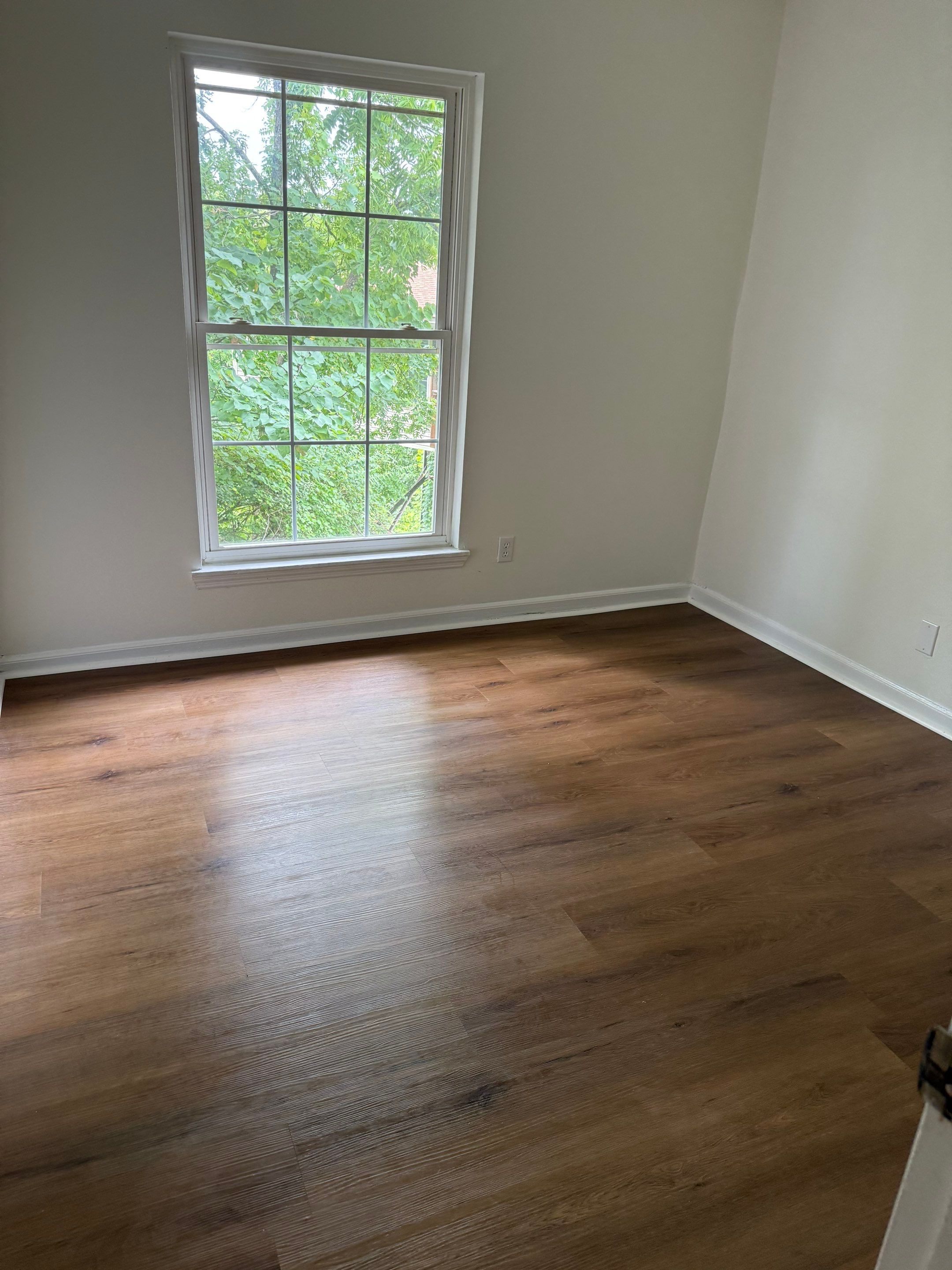 Complete Home Remodel Featuring Custom Kitchen and Wood-Look Plank Flooring by MAJO