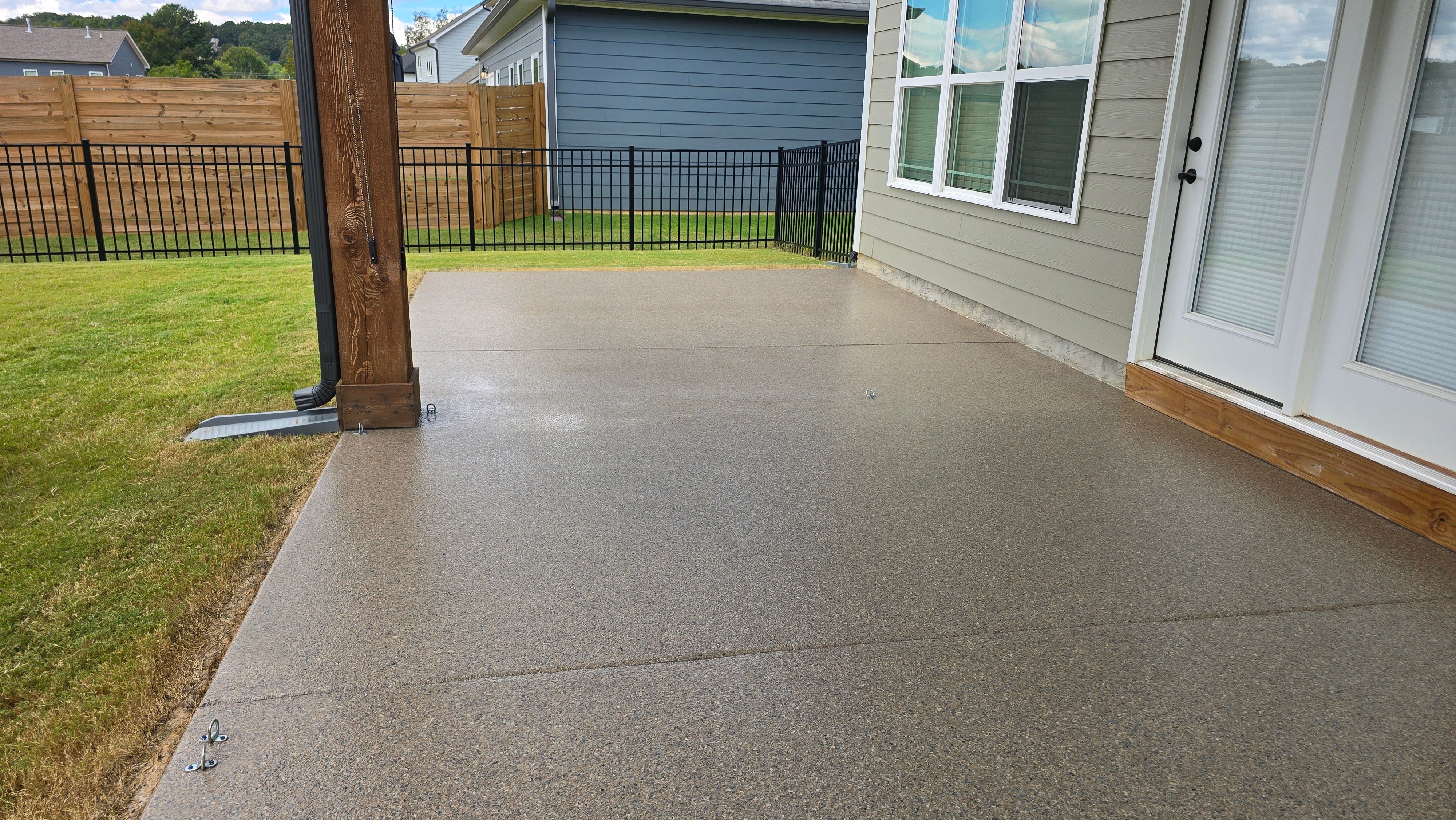 Porch & Patio Completed Using Obsidian & Pumice by Elite Floor Solutions