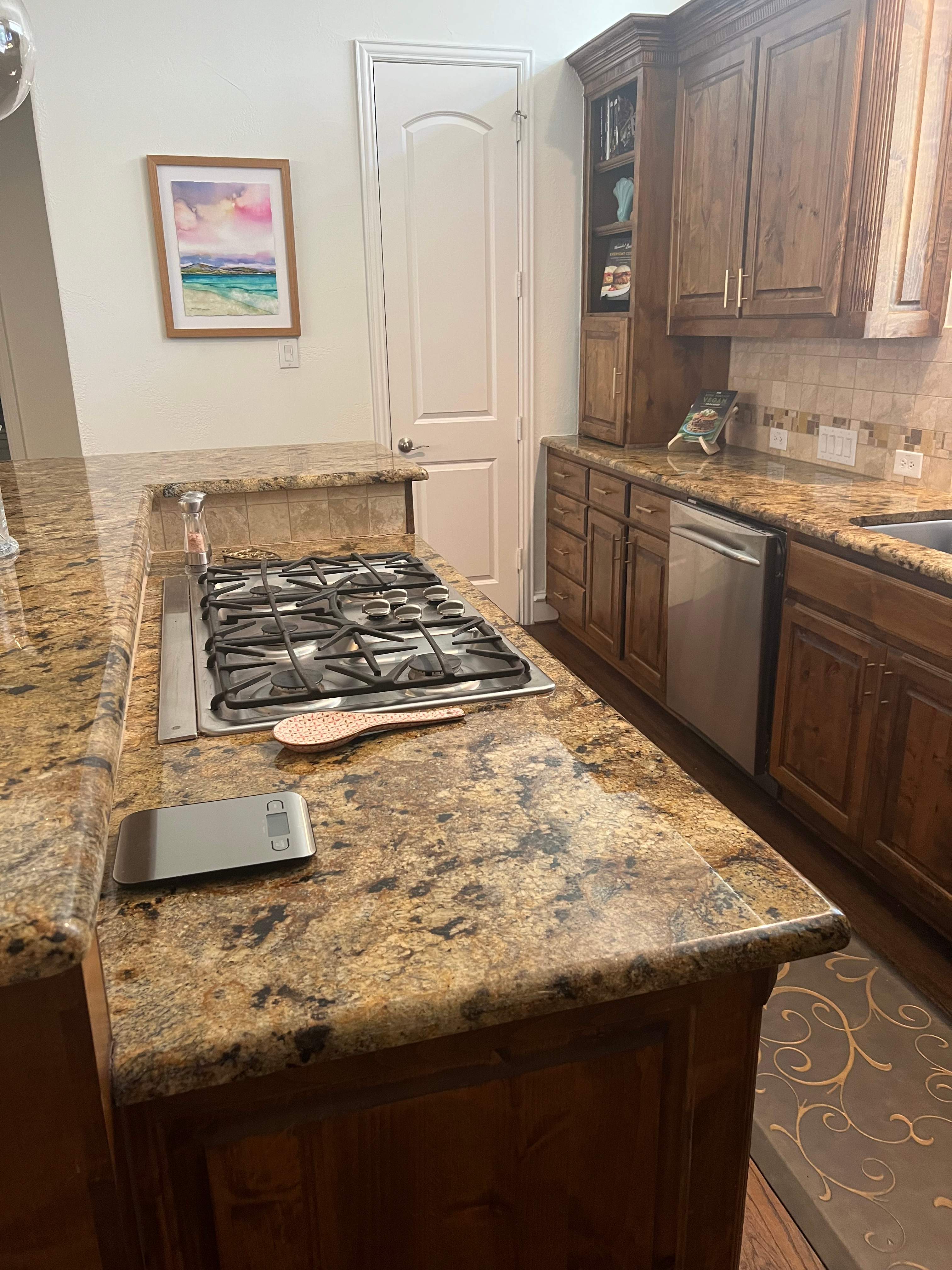Kitchen Remodel using Quartzite by SLM General Contractors & Roofing