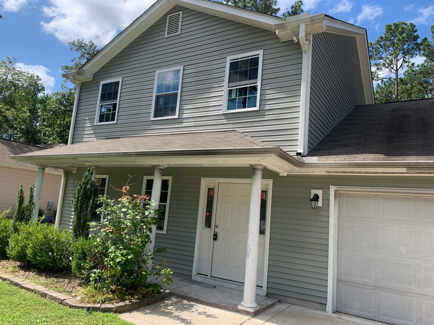 Siding Repair  by American Roofing NC