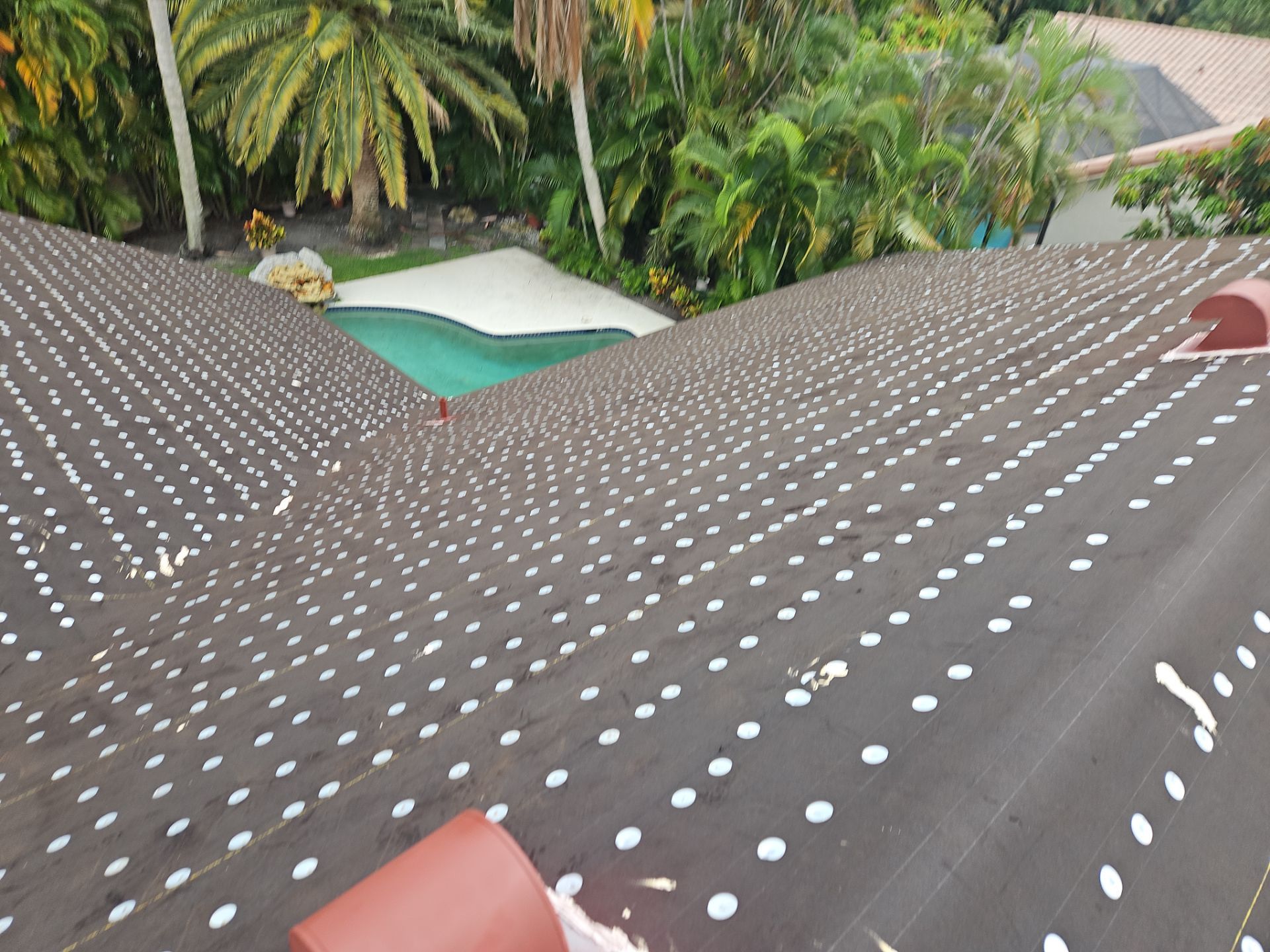 Residential Roofing Installation using 1" Nail strip metal roof by BLUES BROTHERS CONSTRUCTION CORP