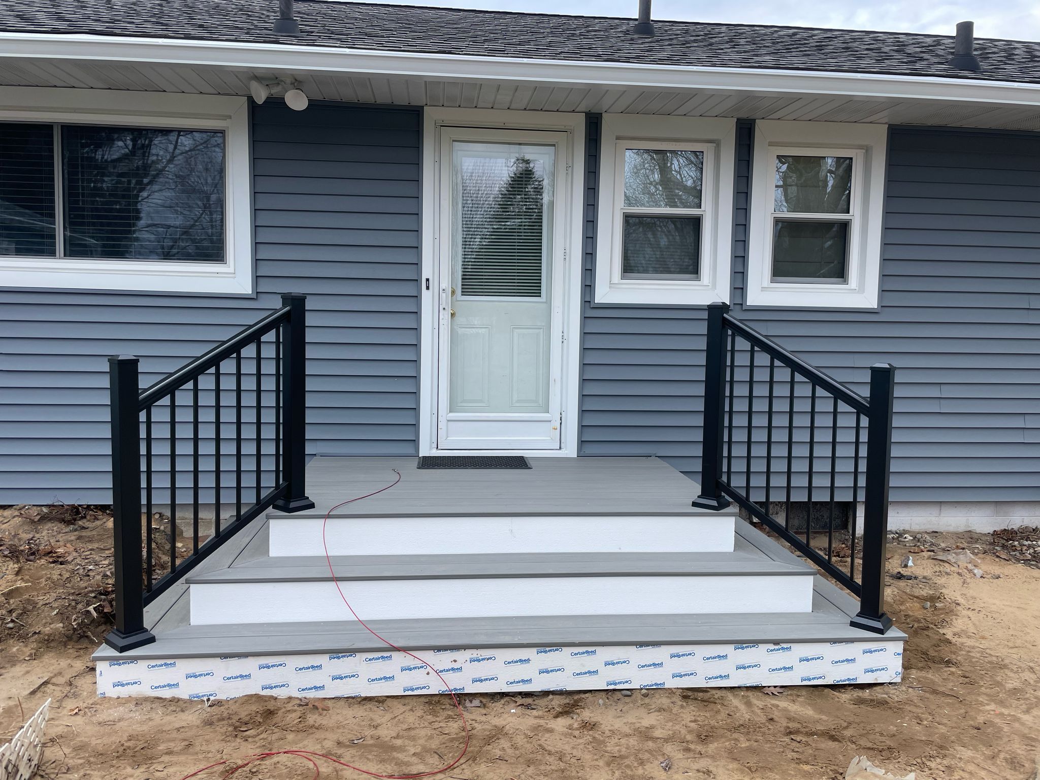 Siding, Front and Back Porch  by Avalon Roofing and Exteriors
