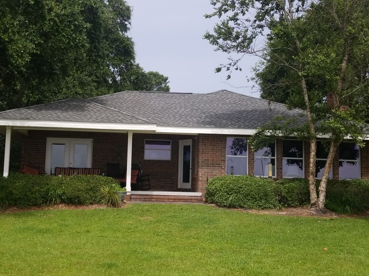 Residential Roofing Installation using Roof Replacement by American Roofing & Construction LLC