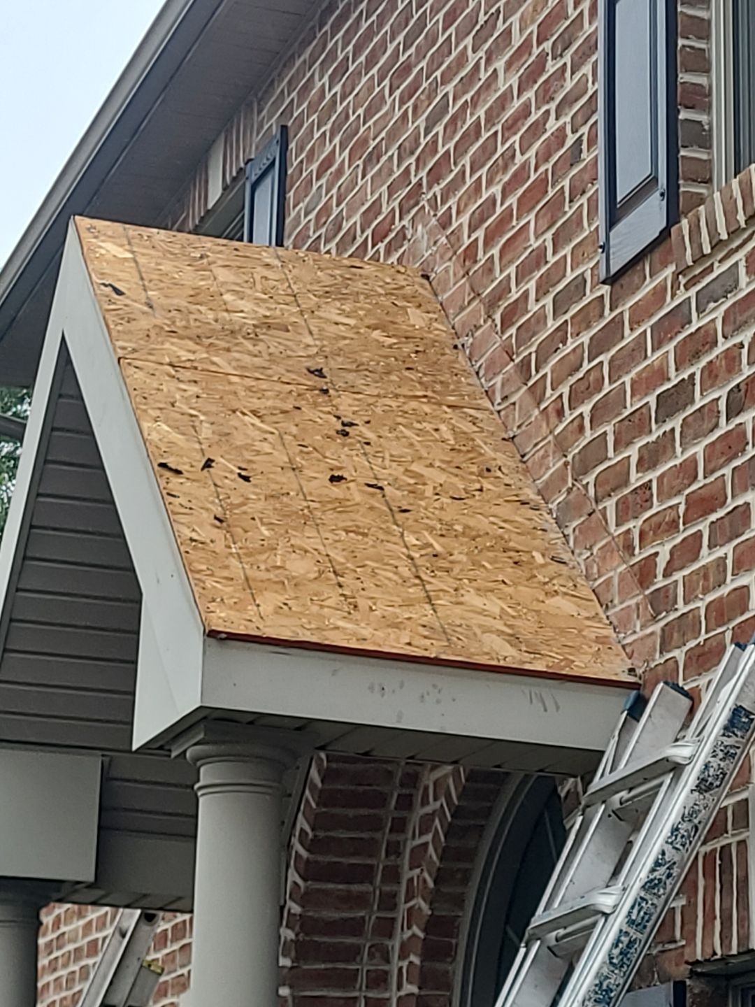Front Porch Metal Awning Replacement in York PA | Bealing Roofing by Bealing Roofing & Exteriors