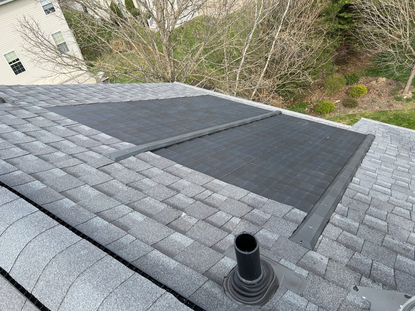 Solar Roof Replacement using GAF Timberline Solar Shingles by American Home Contractors