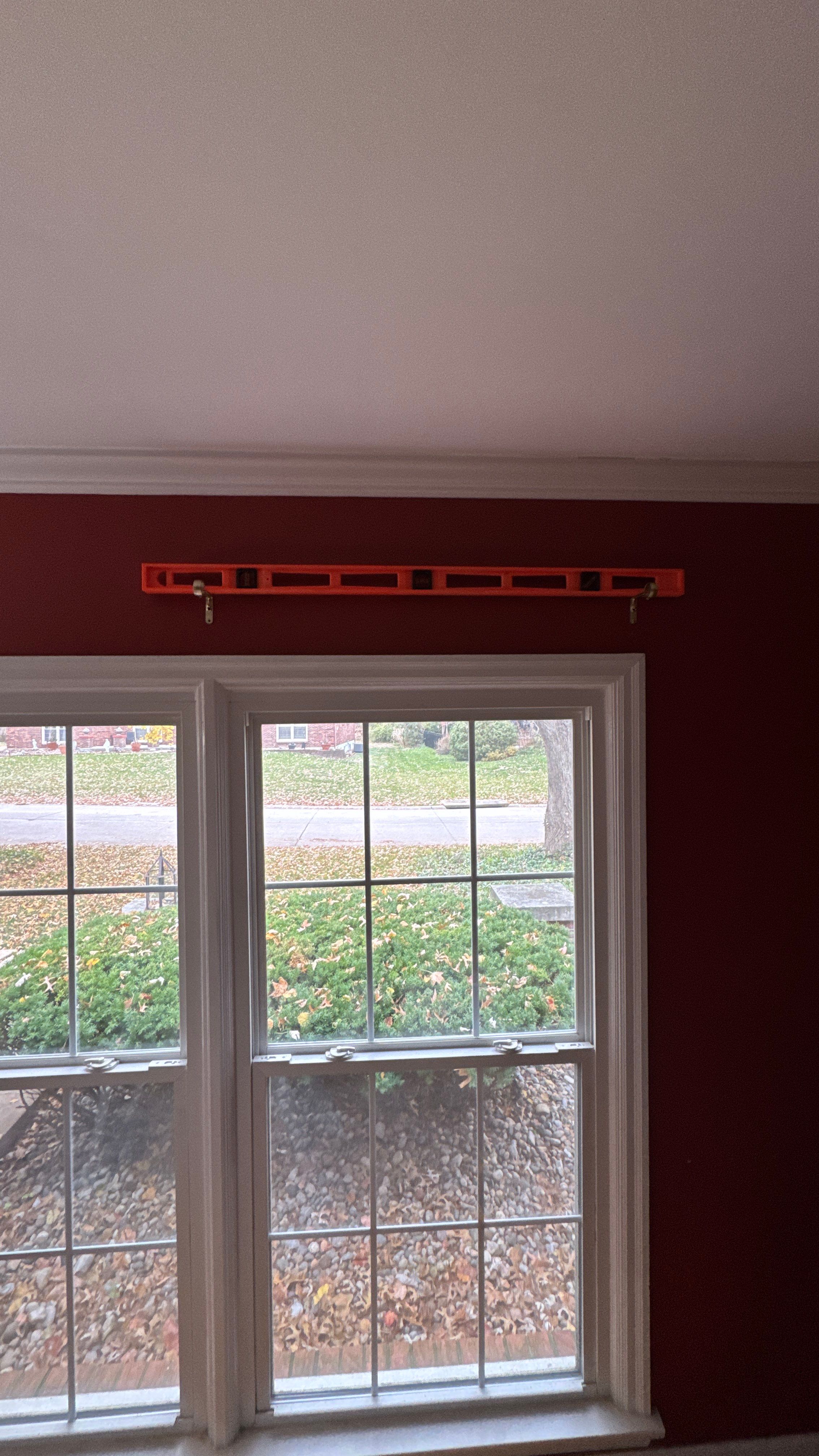 Handyman Project - Hanging Curtain Rods by Legendary Services Company LLC.