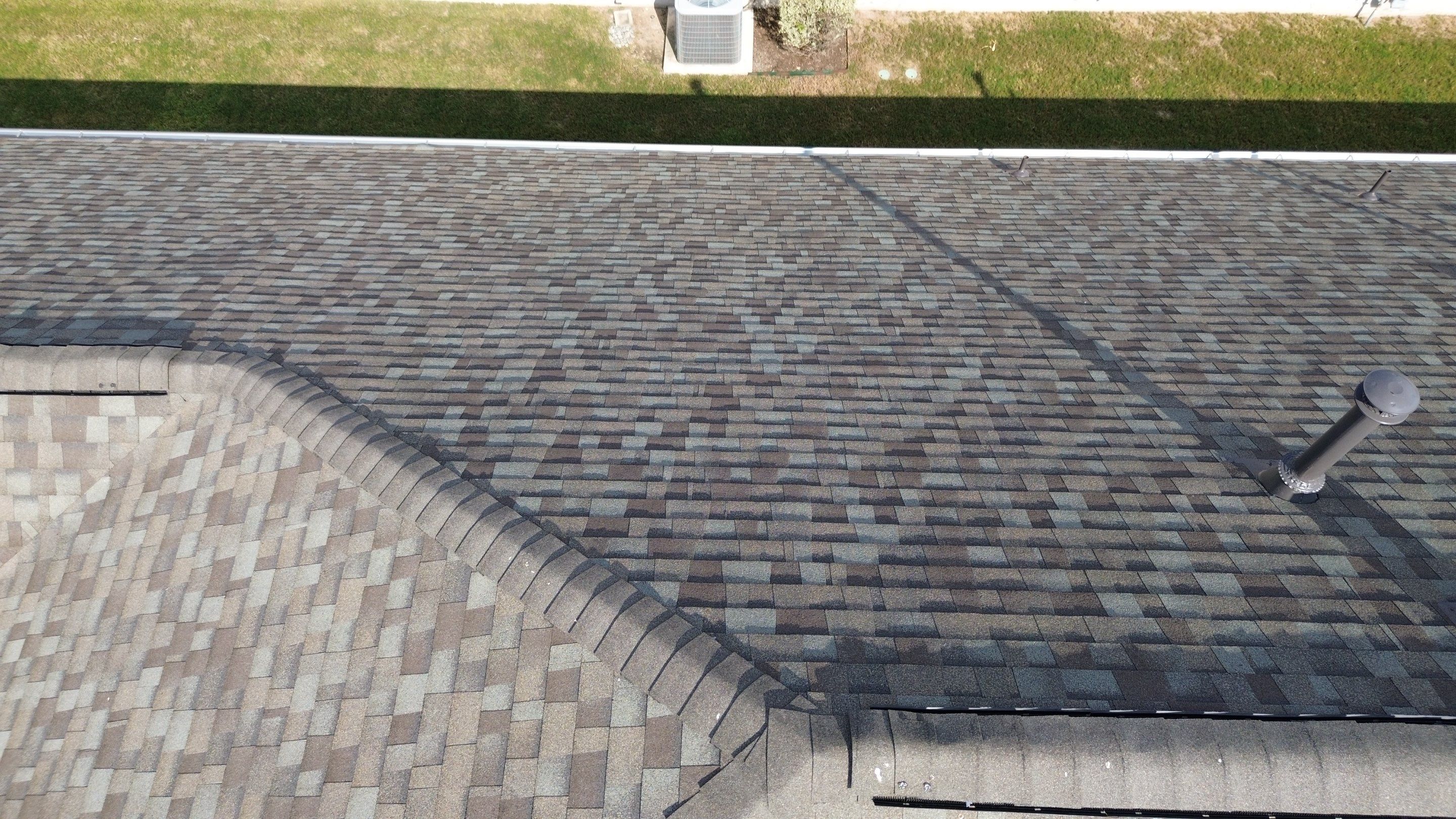 Full Roof Replacement with Solar Reinstall – Duration Driftwood | Round Rock, TX by Kstylez Roofing & Construction