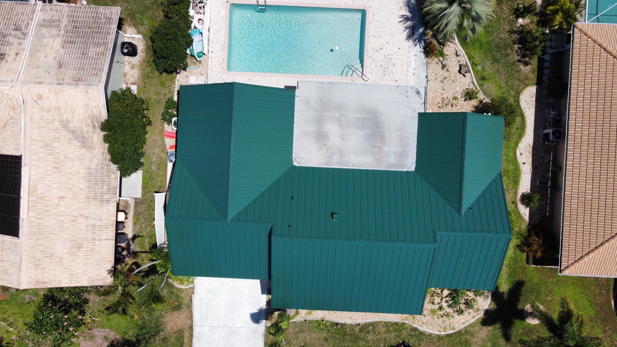 Residential Roofing Installation using Gulf Coast Metals Gulf Seam Panels by Four Peaks Roofing