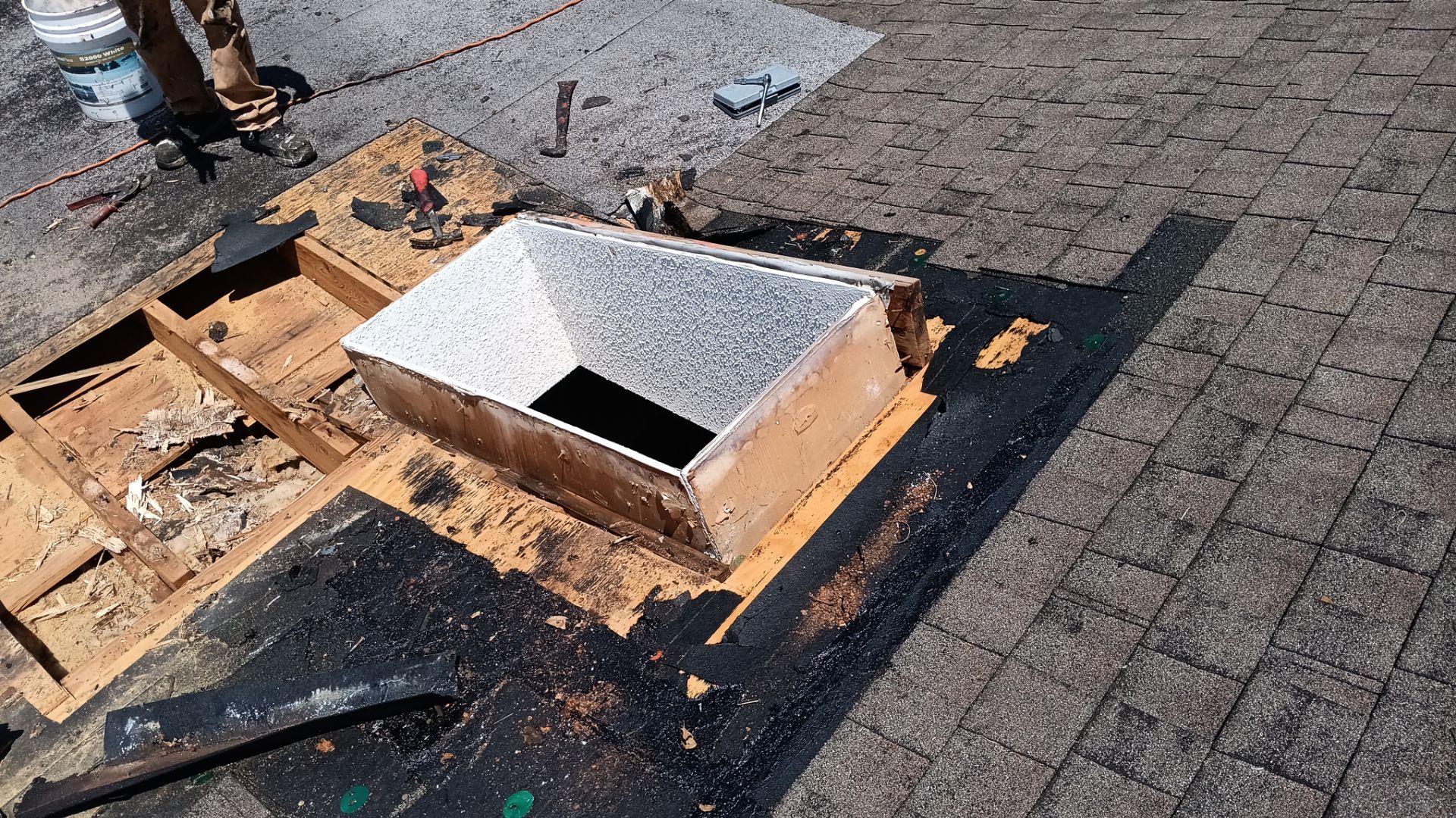 REPLACE NON APPROVED SKYLIGHT ALONG WITH CLOGED GUTTER by Morton Roofing, Inc.