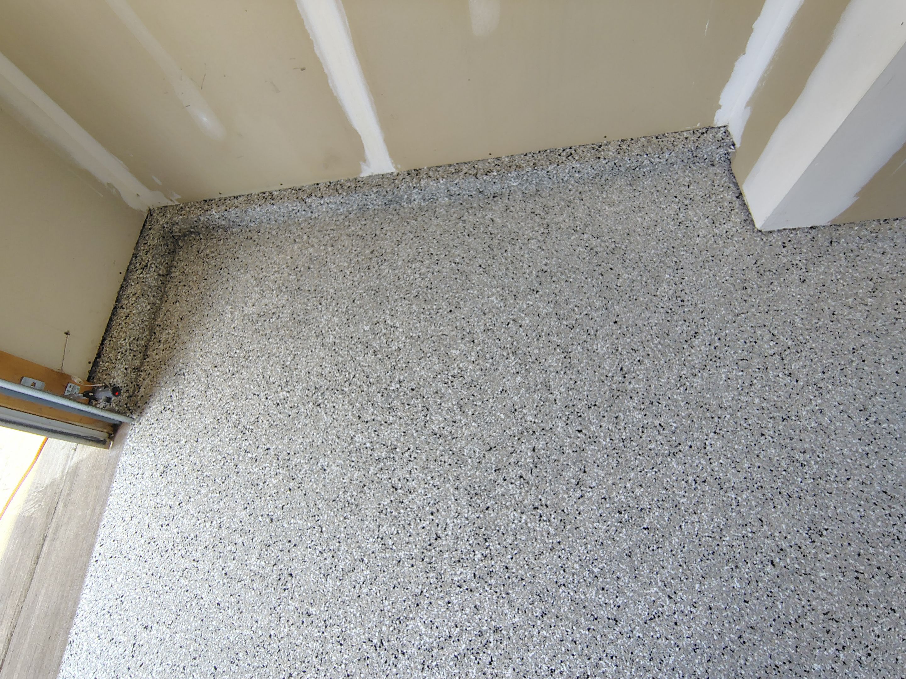 Epoxy Garage Floor Coating with Decorative Flake in Harrisburg by Select Painting, Coatings & Garage Cabinets