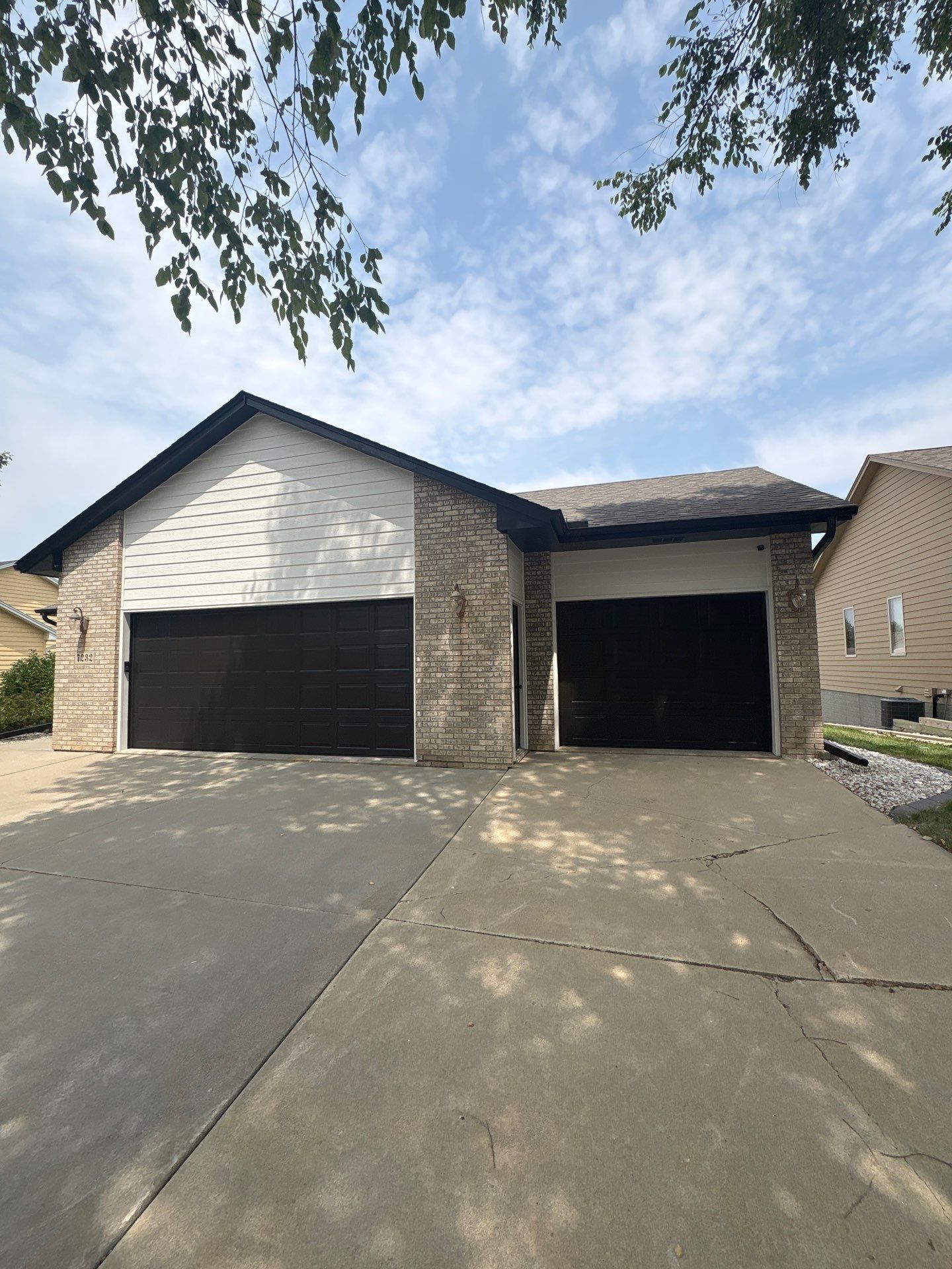Residential Exterior Painting and Siding Refresh in Sioux Falls by Select Painting, Coatings & Garage Cabinets