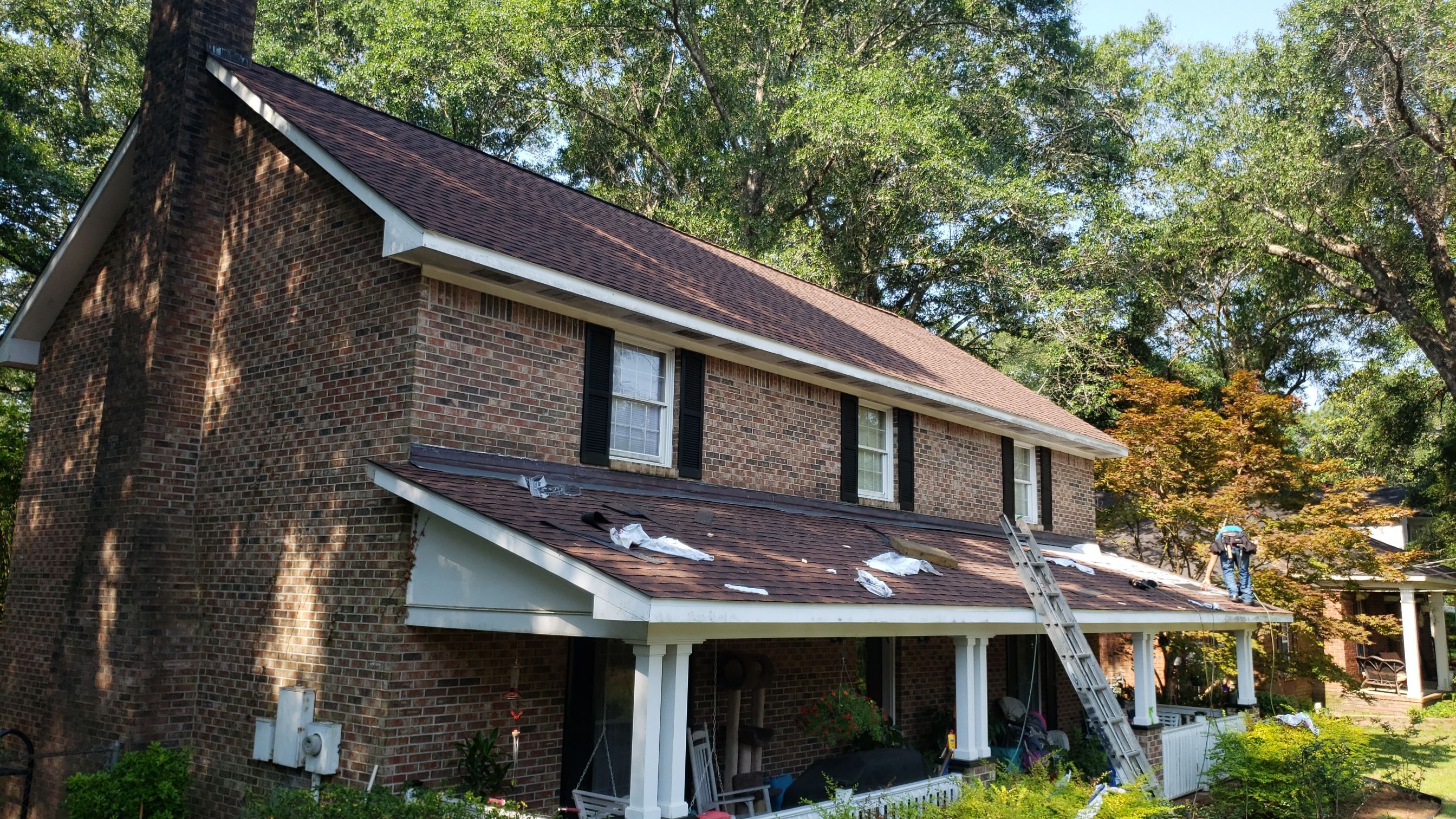 Residential Roofing Installation using Roof Replacement by American Roofing & Construction LLC