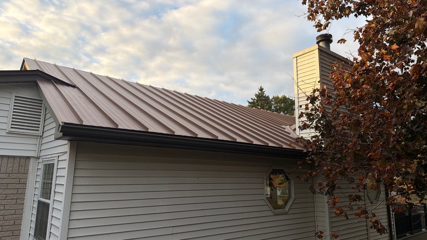 Roof Replacement using MS Standing Seam Roof Western Rust by 180 Contractors