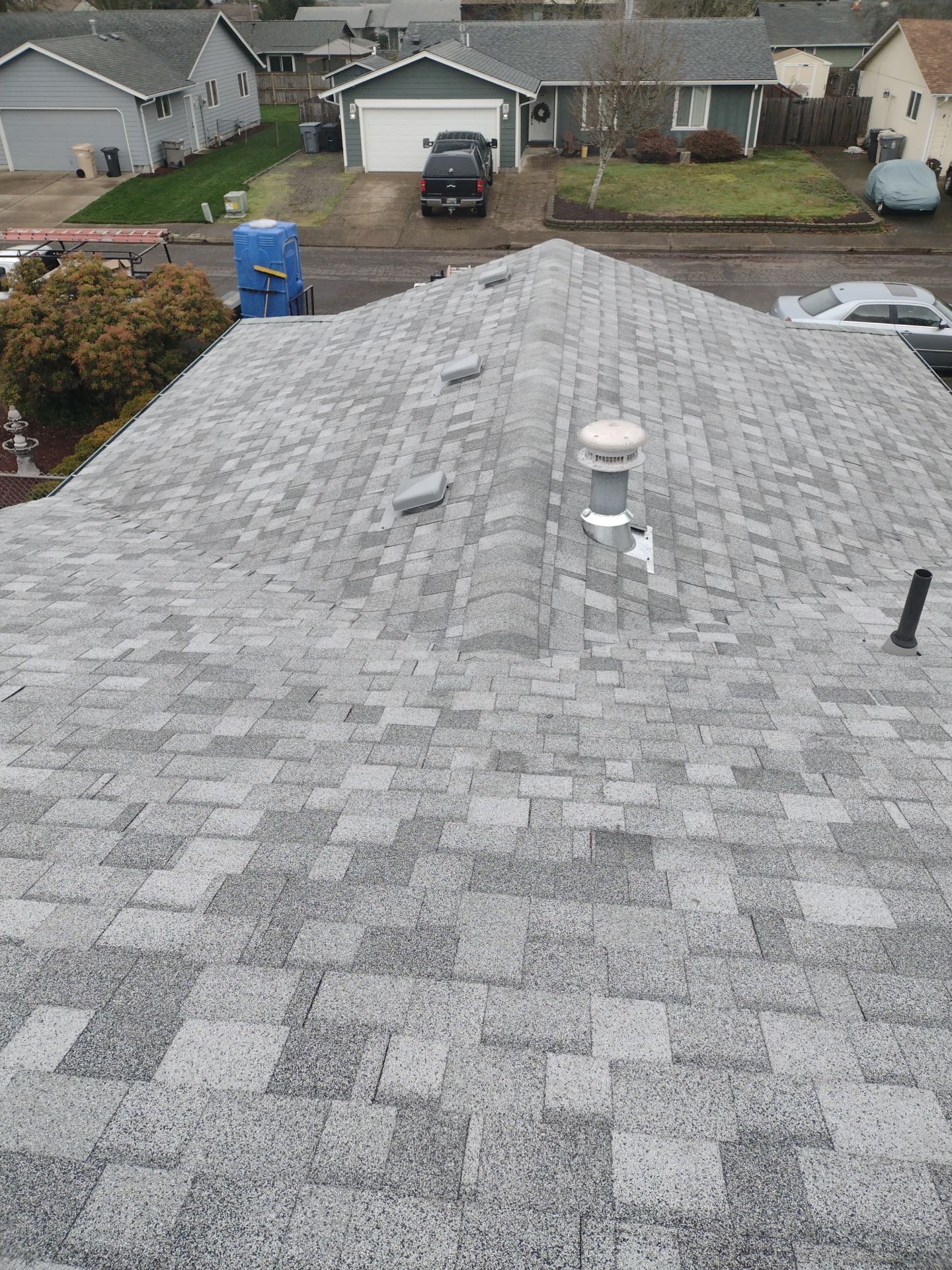 Residential Roofing Installation using IKO Dynasty (Color: Frostone Grey) by Orezona Building & Roofing Company, Inc.