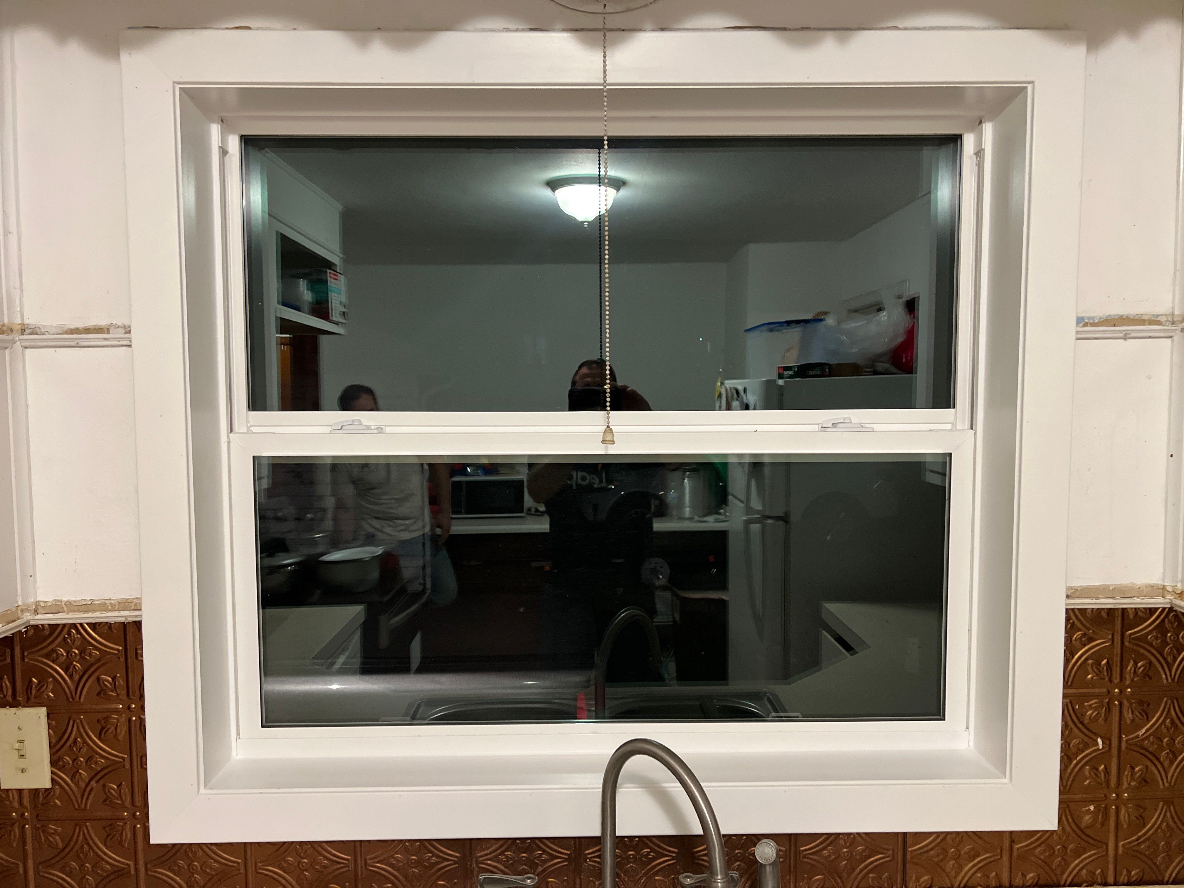 Pella Window installation using Pella 250 series vinyl window by United Windows and Siding LLC