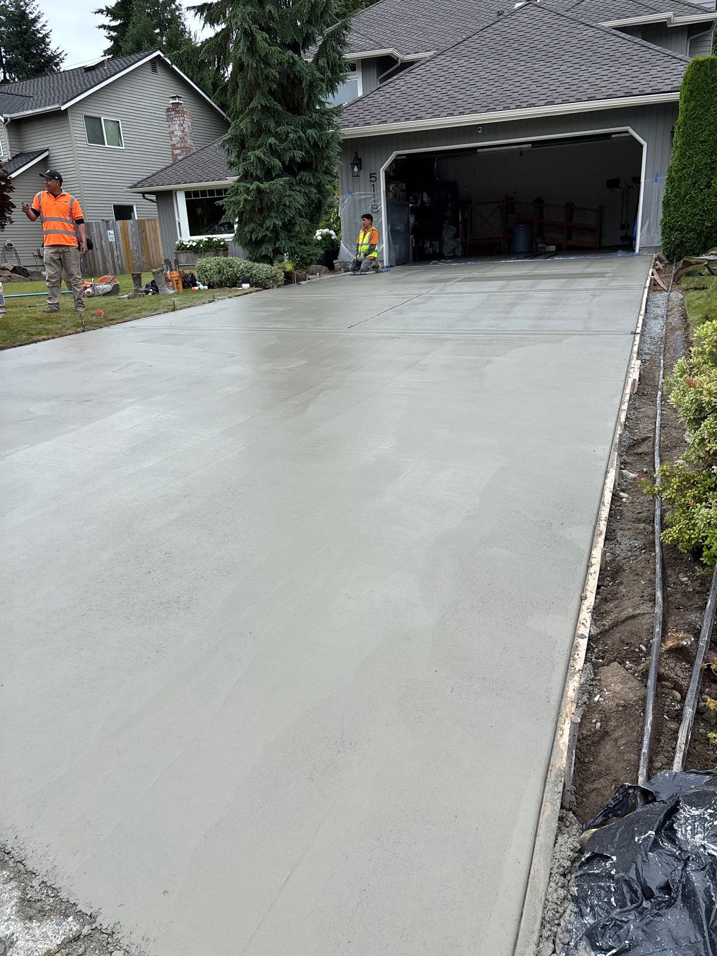 Exposed Aggregate Concrete Driveway Makeover  by Jireh Asphalt & Concrete Inc 