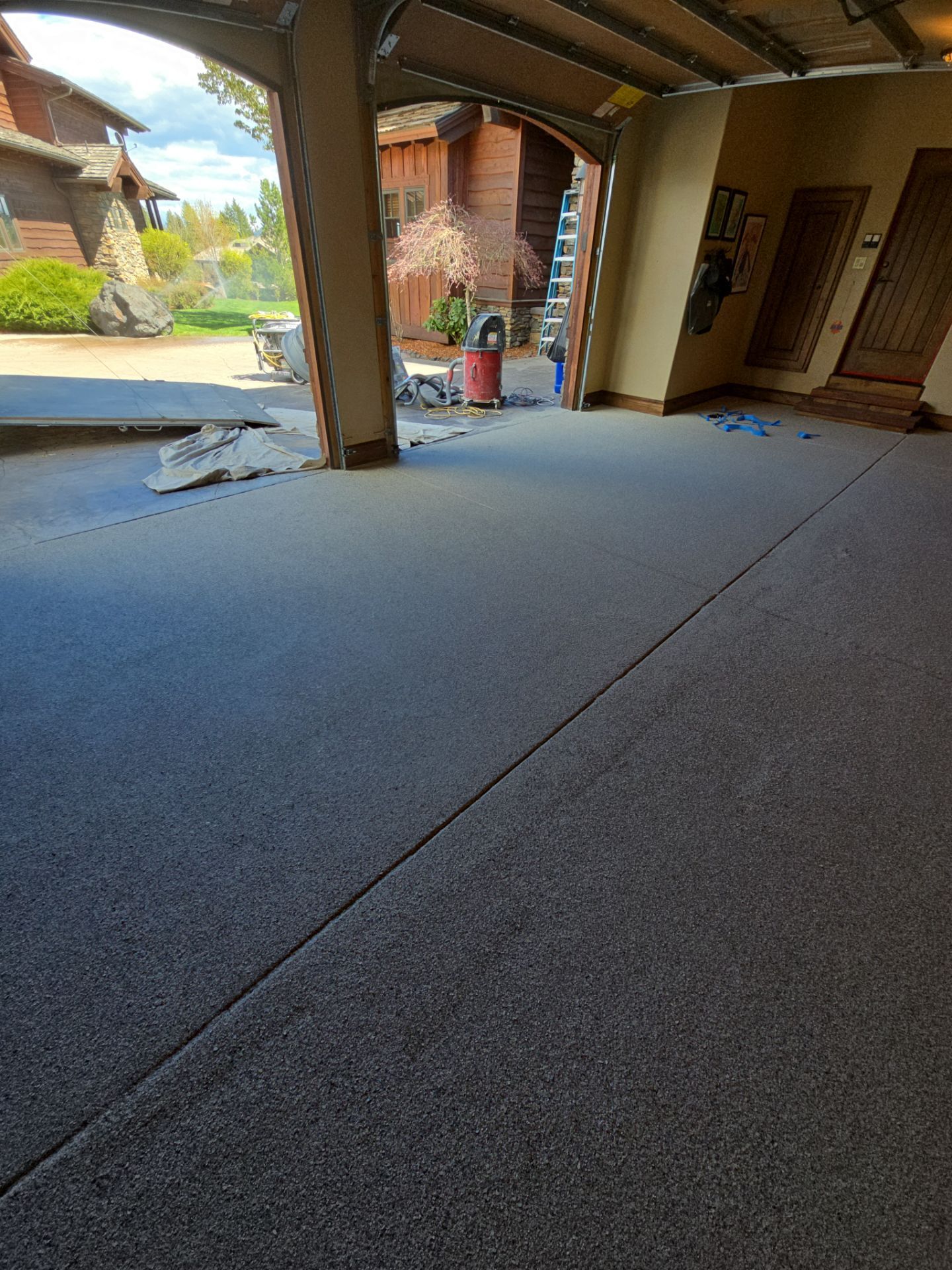 Garage Transformation using Stone/Marble Hybrid by Croc Coatings, LLC