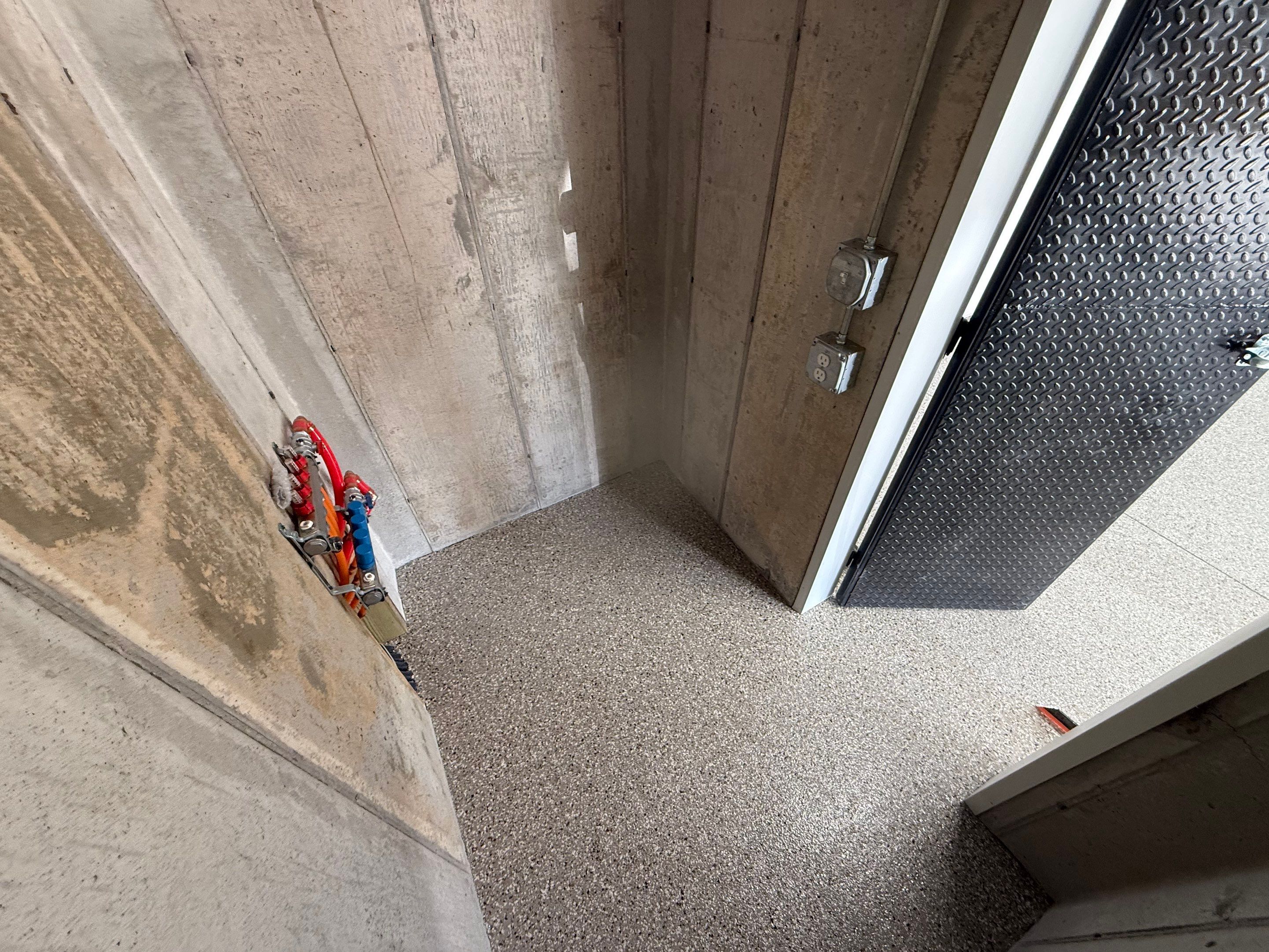 Creekbed Flake Coating in Woonsocket, SD by Select Painting, Coatings & Garage Cabinets