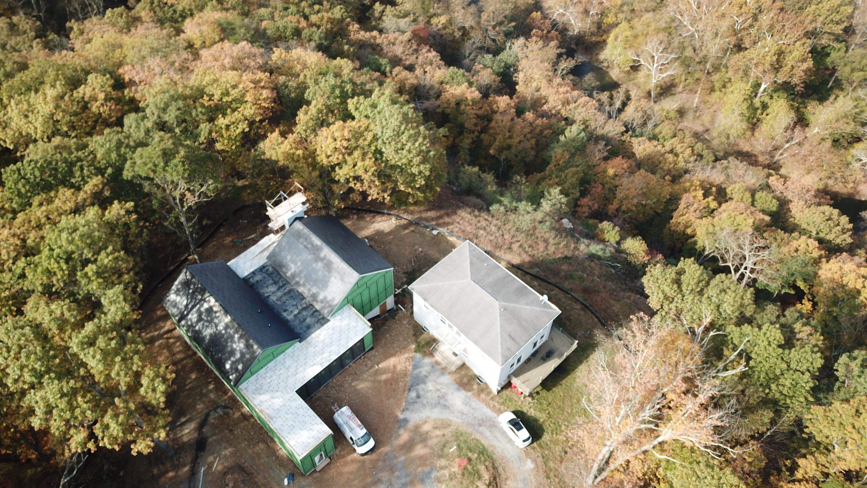 Roof Installation using Tesla Solar Roof V3 by American Home Contractors