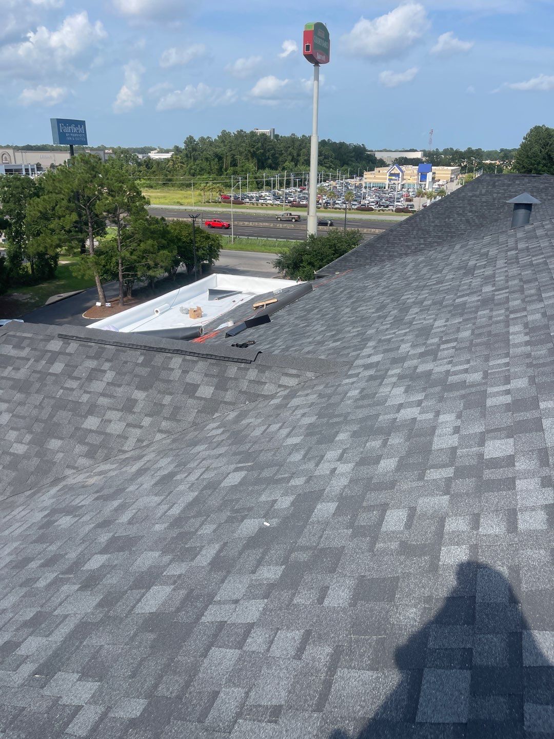 Commercial Roofing Installation using Roof Replacement by American Roofing & Construction LLC