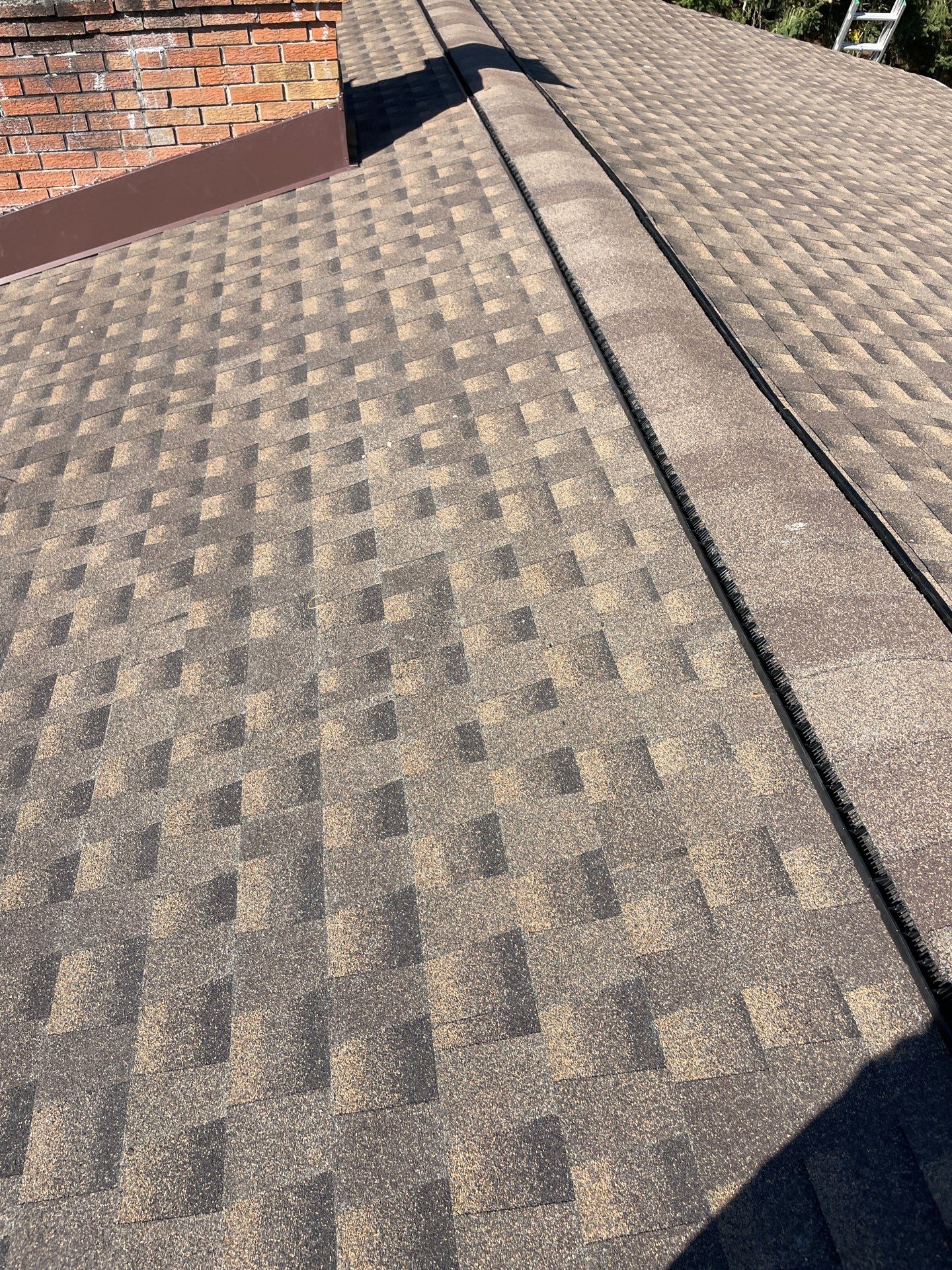 Residential Roofing Installation using GAF TImberline HDZ Hickory by Rainstoppers Roofing