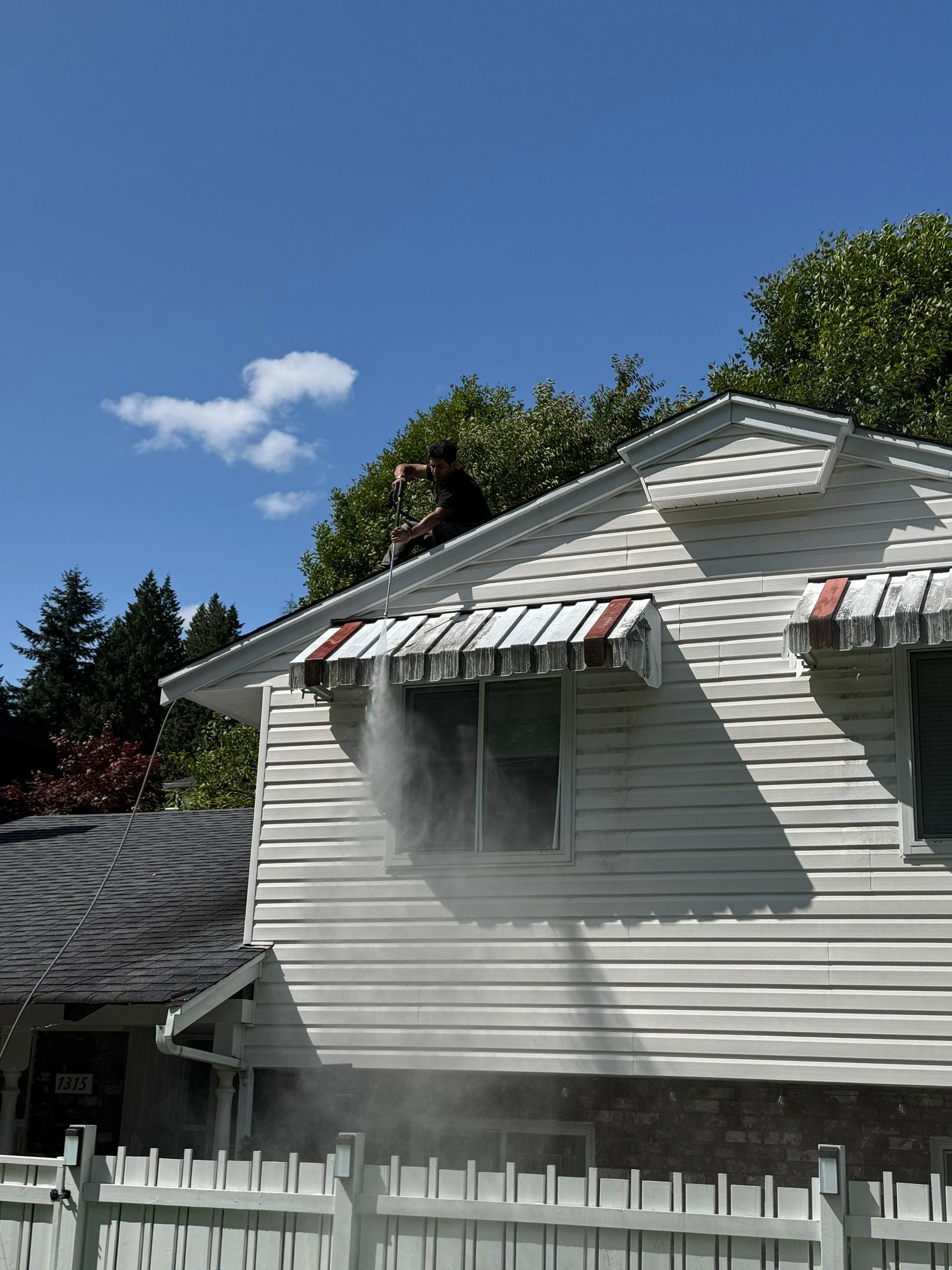 Repair Damaged Gutter & Power Wash House Siding by YVR Construction Group