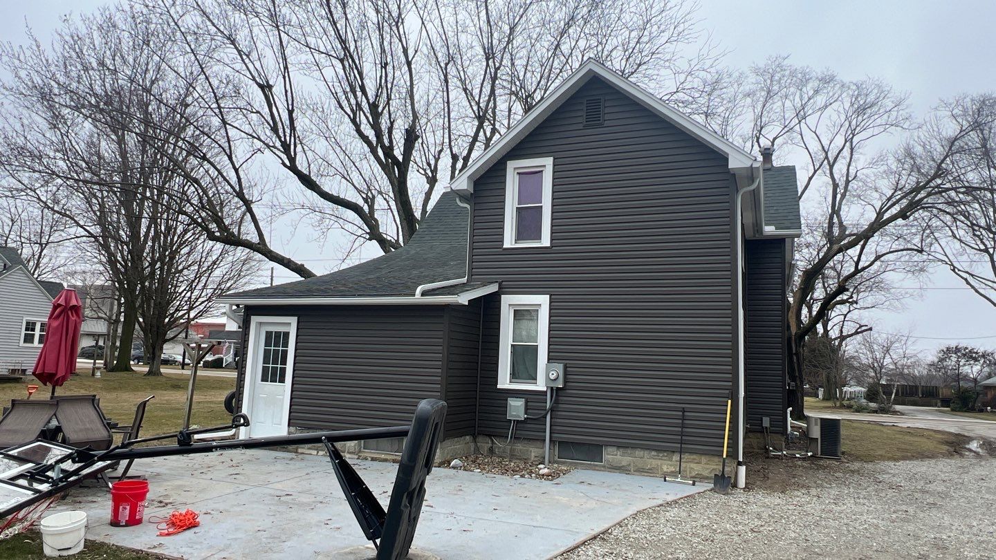 Residential fascia replacement using Exterior Portfolio 4.5 DL - Peppercorn by Nitro Roofing and Construction