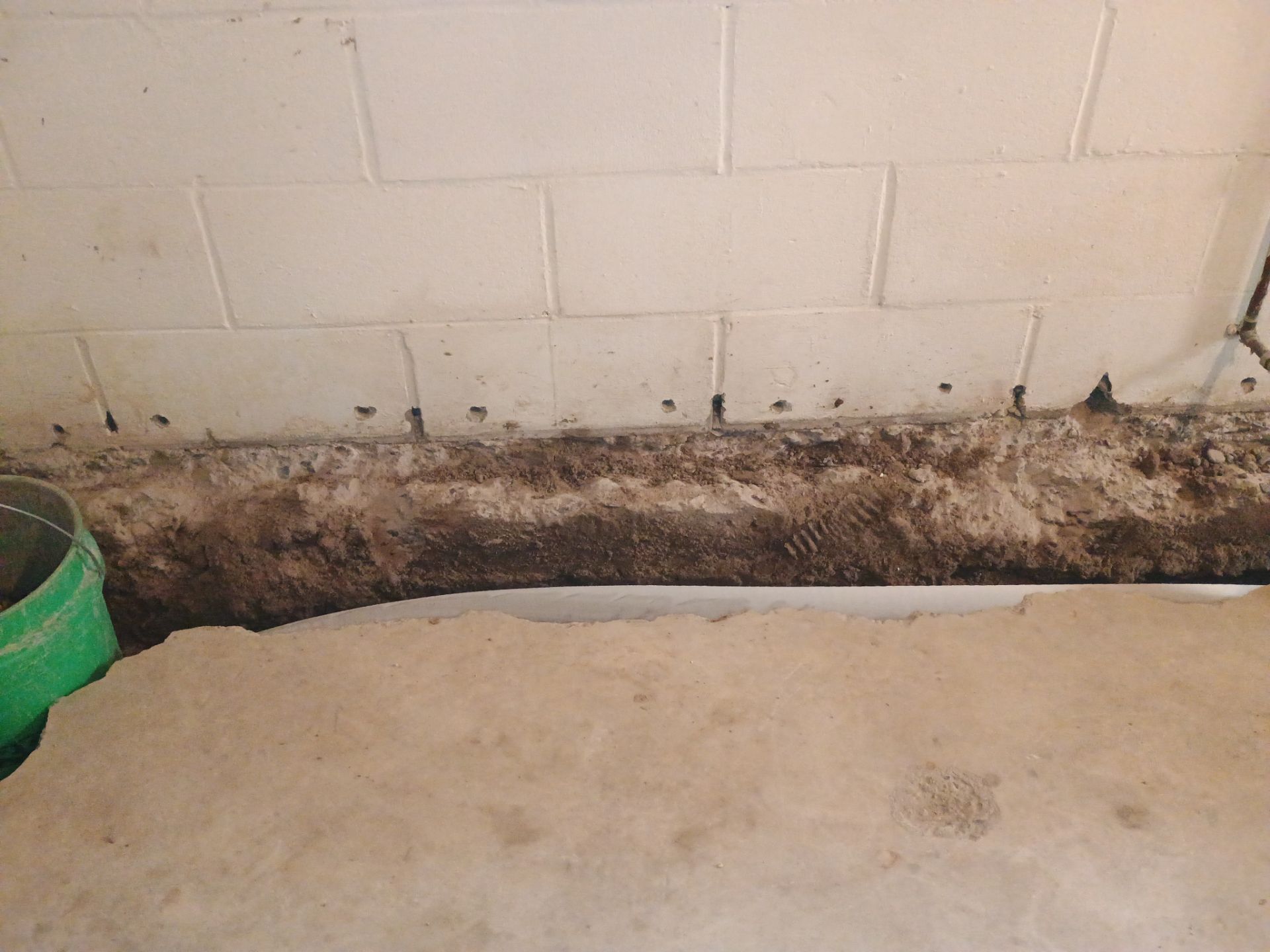 Tying Into an Existing Drain Tile System for Alec by Waterproofing Northeast