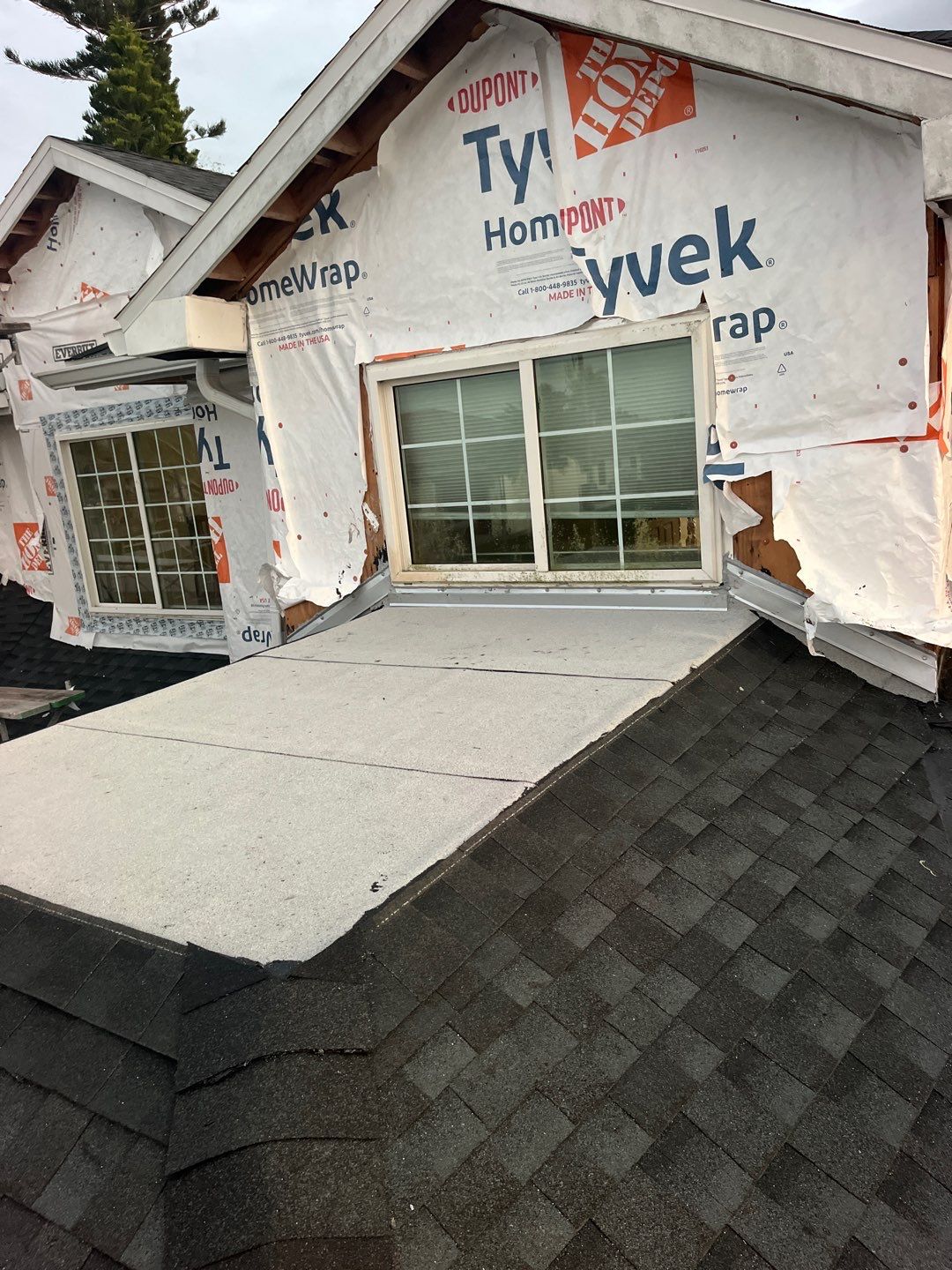 Shingle roof repair by Durabilis Roofing INC