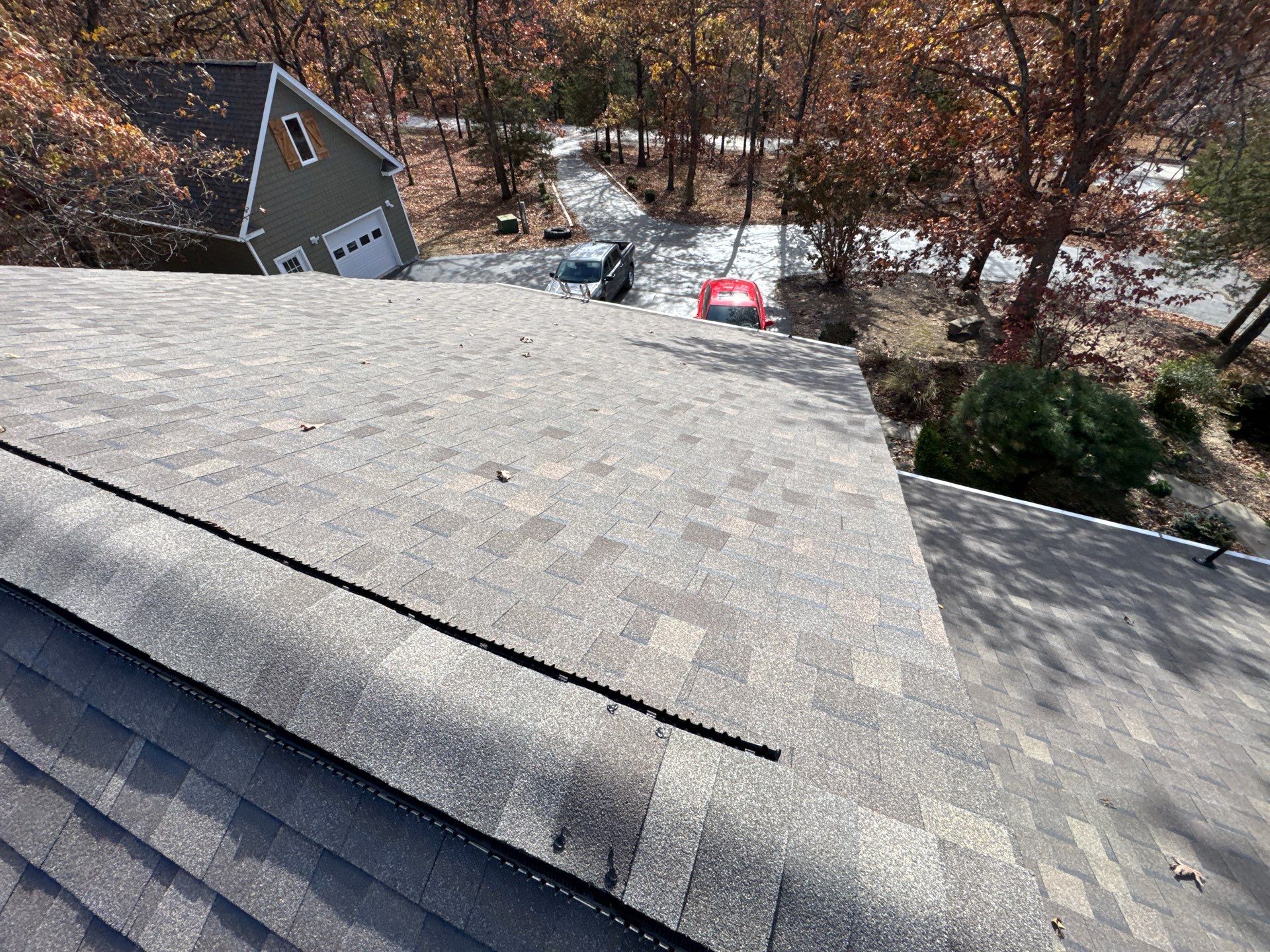 Residential Roof + Gutters & Downspouts & Gutter Guards Install  by Titan Commercial & Residential Roofing 