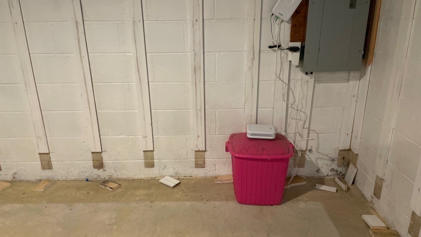 Interior Drain Tile & Buried Discharge in St. Anthony, MN by Waterproofing Northeast
