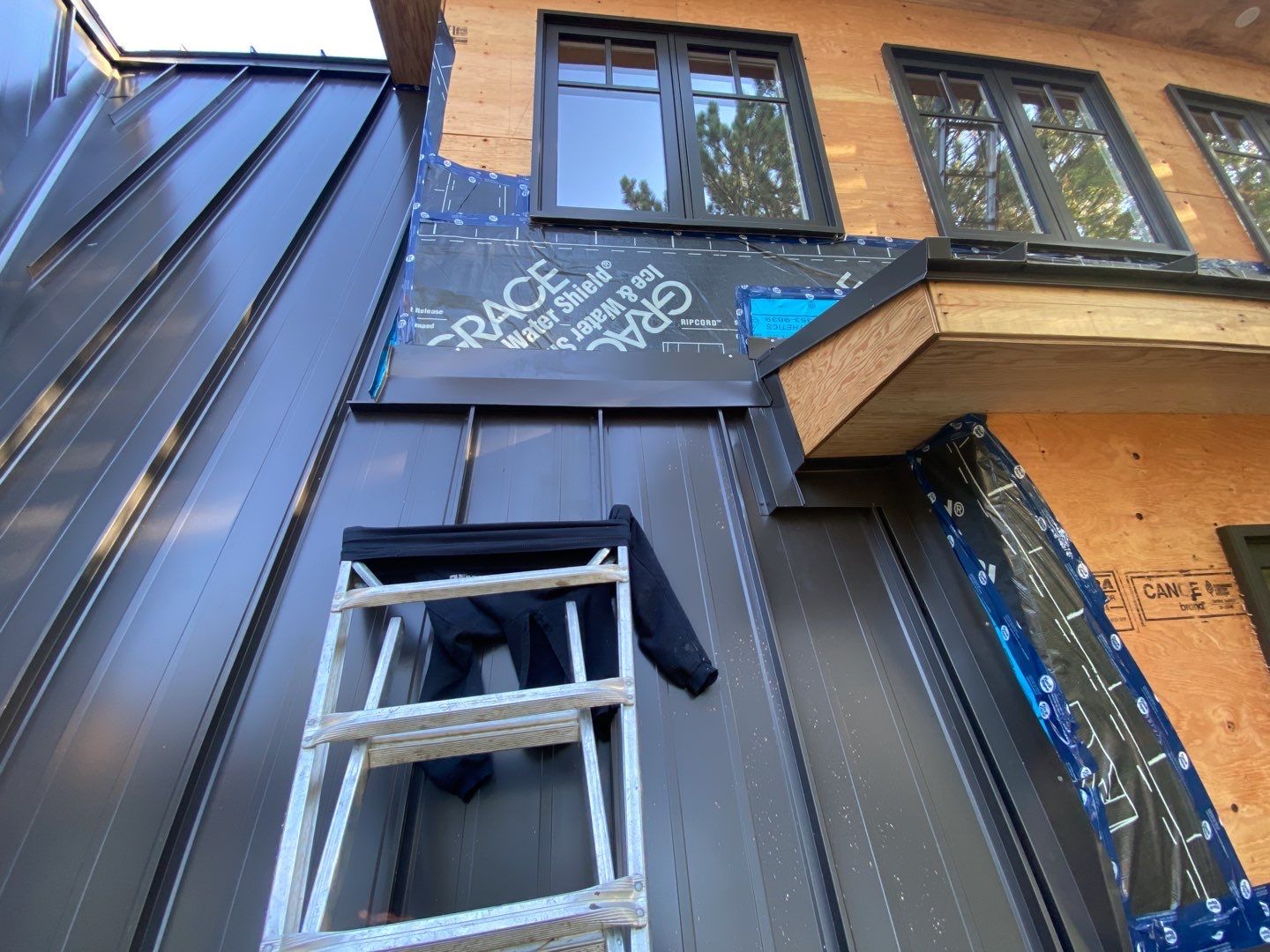 Residential Roofing Installation using 16" Standing Seam Panels by Jay Carter Roofing & Sheet Metal