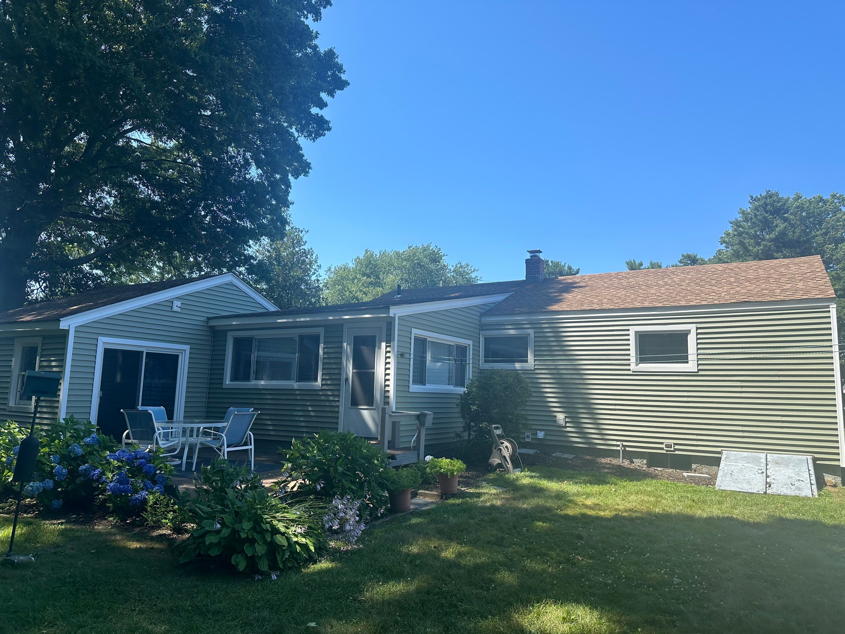 Siding Installation using Clapboard Monogram D4 Cypress by A Plus Exterior